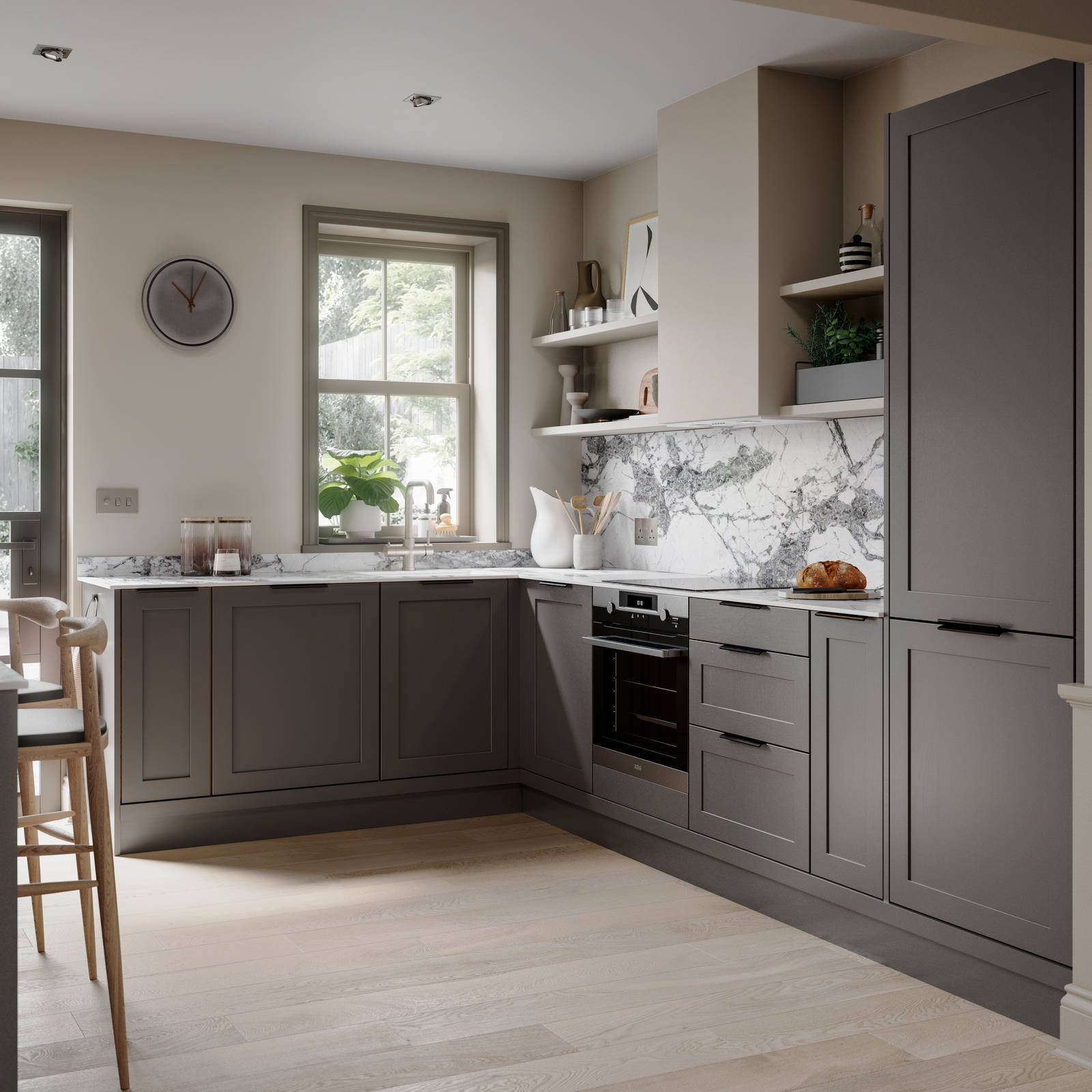 Shaker kitchen in dark grey shade Charcoals, matched with a marble worktop and backsplash.
