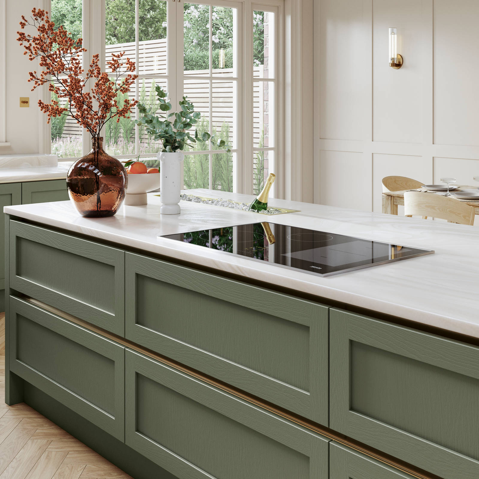 Kitchen island in Integra Wardley shade Misty Moor with narrow framing and integrated handles, on a painted timber finish.
