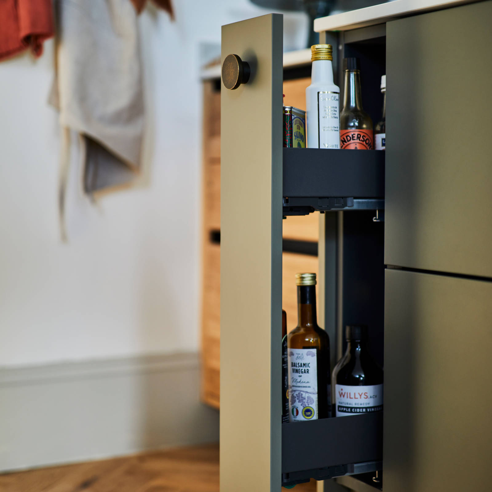 Modern slab Soho cabinets in the Balmoral colour, a soft beige green tone