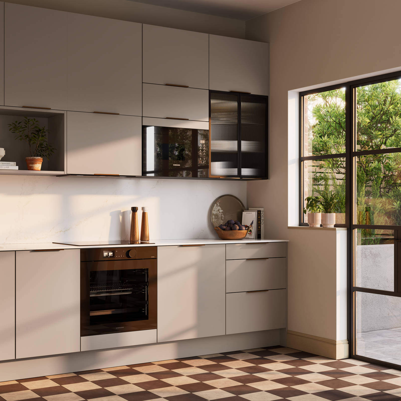 Angled view of modern slab front Soho Cornish Clay kitchen from Magnet in Pantone’s colour of the year ‘Mocha Mousse’ with bronze trim handles, handles, silestone quartz worktop and matching backsplash, checkered flooring.