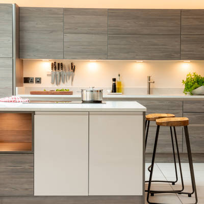 View of light Luna Cashmere kitchen cabinetry in Integra Ascoli Fleetwood Graphite.