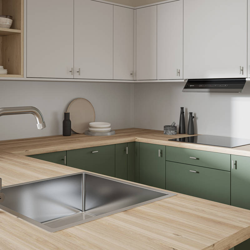 Oak laminate worktop in contemporary scandi influenced Ascoli Woodland and light grey kitchen, with a steel sink and tap and knurled brushed nickel t-bar knobs.
