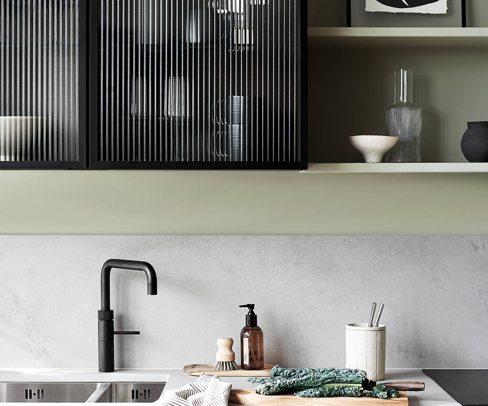 Nordic Nature. Modern wooden kitchen design with a Nordic influence. Featured floating worktops, a ribbed plinth and rounded end panels.