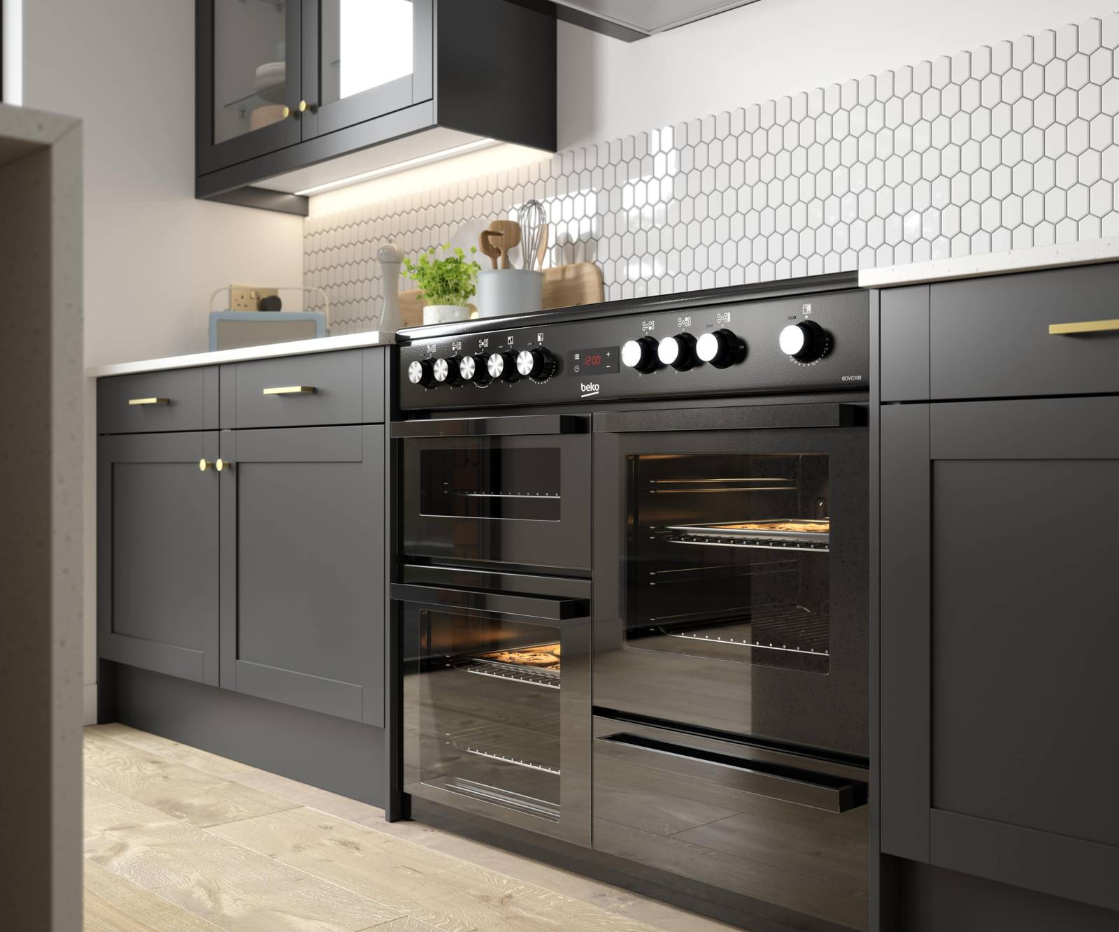 Close-op of Hobs in Tatton Midnight kitchen from Magnet, a contemporary dark blue narrow frame shaker door.