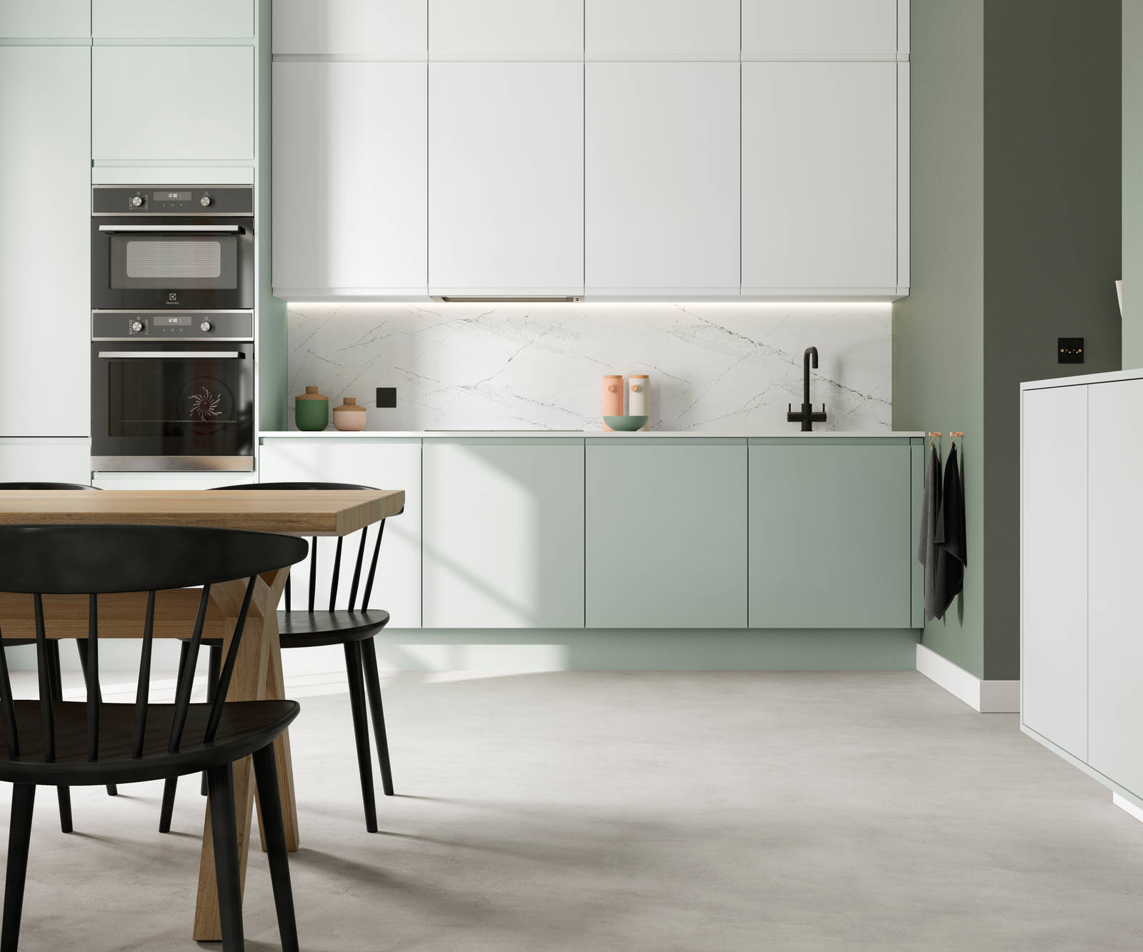 Minimalist kitchen design Luna, in the light and airy green shade Seagrass, with its integrated handle that gives any kitchen a beautiful, sleek finish.