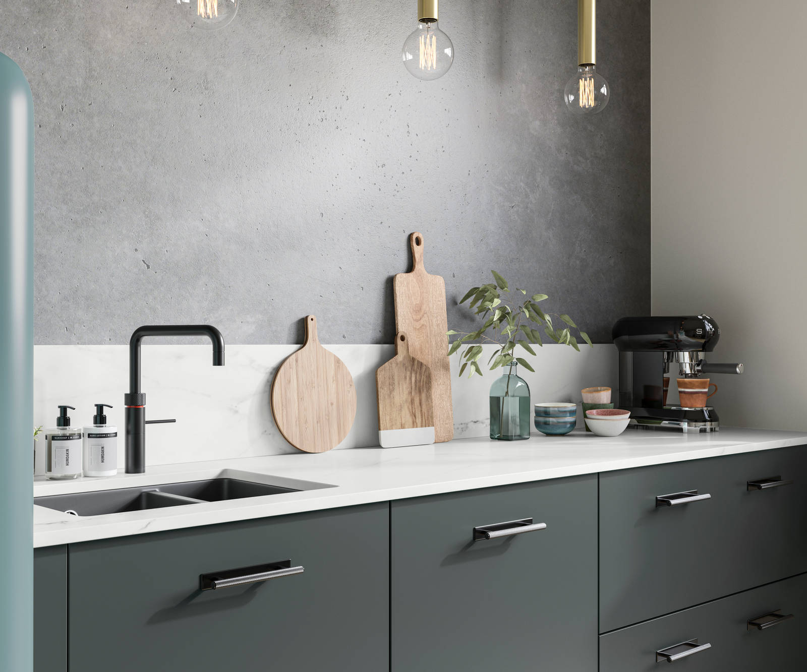 Soho kitchen in Arboretum Green with a blue Smeg fridge, black handles, tap and sink.