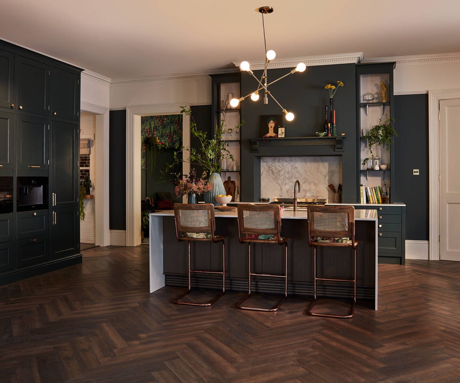 Traditional Shaker-style kitchen range featuring panelled doors with visible woodgrain and beading detail