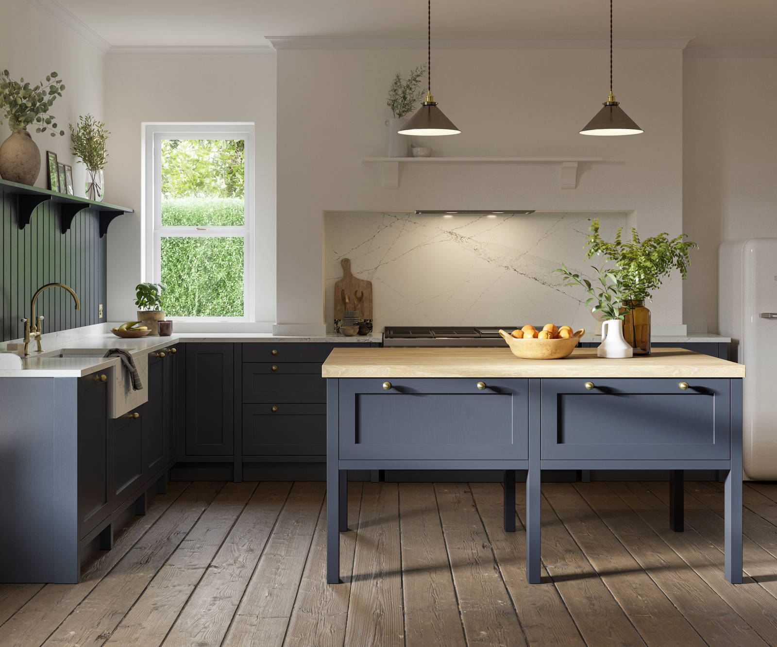Open floorplan shaker kitchen in the dark blue shade Midnight, paired with a kitchen island and white Smeg fridge.