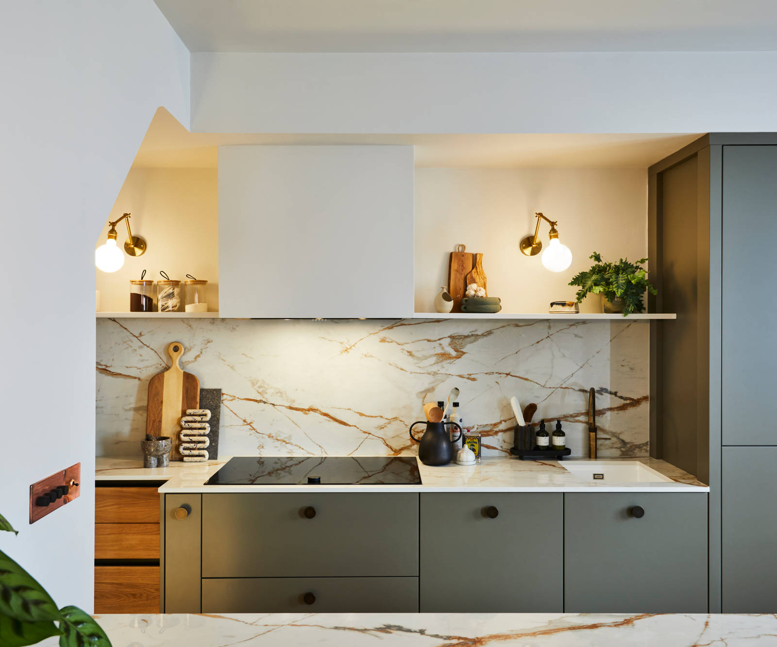 Modern slab Soho cabinets in the Balmoral colour, a soft beige green tone