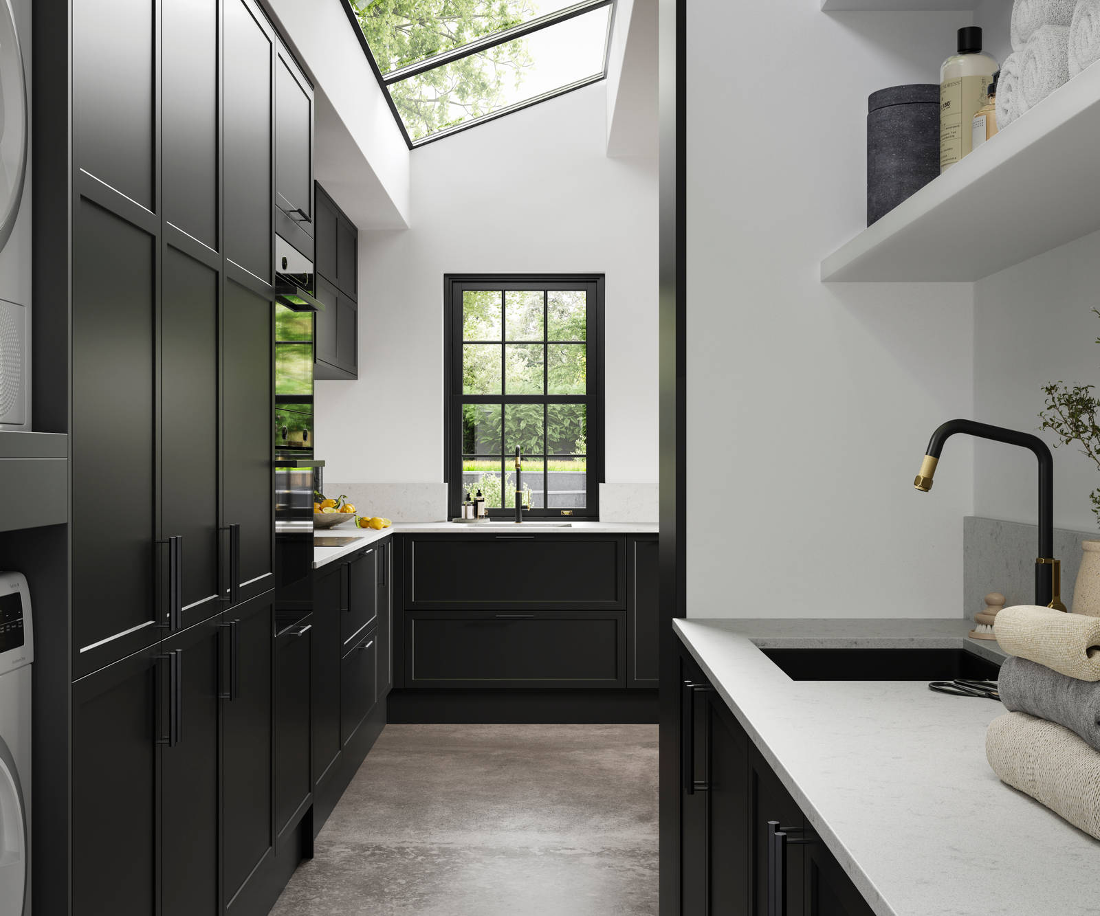 View of Modern Shaker kitchen Brunswick Sumi Black from laundry room, with integrated laundry machine and dryer, a work area with a black sink and tap,  black hex handles on cabinets and white worktop and splashback Silestone Miami Vena.