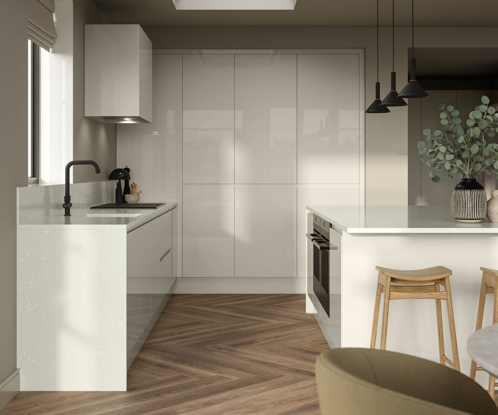 Corner of Luna Gloss Limestone kitchen with tall cabinets, kitchen island featuring an integrated oven, a breakfast bar with wood stools, a black tap and white extractor hood, Amtico smouldered oak in parquet flooring.