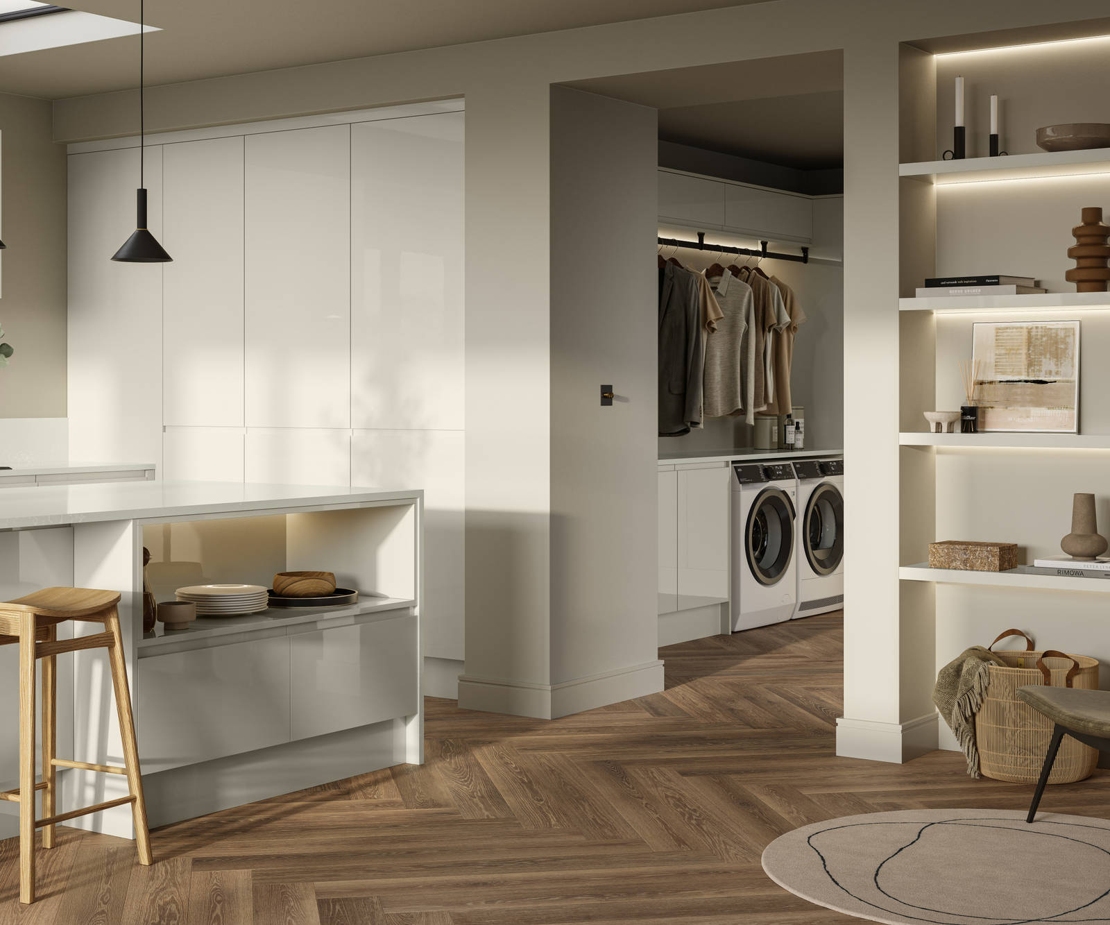 Open plan contemporary Luna Gloss kitchen with a kitchen island, breakfast bar, tall cabinetry, matching open shelves in living room with natural material decorations and utility room with integrated washing machine and tumble dryer, Amtico smouldering oak parquet flooring.