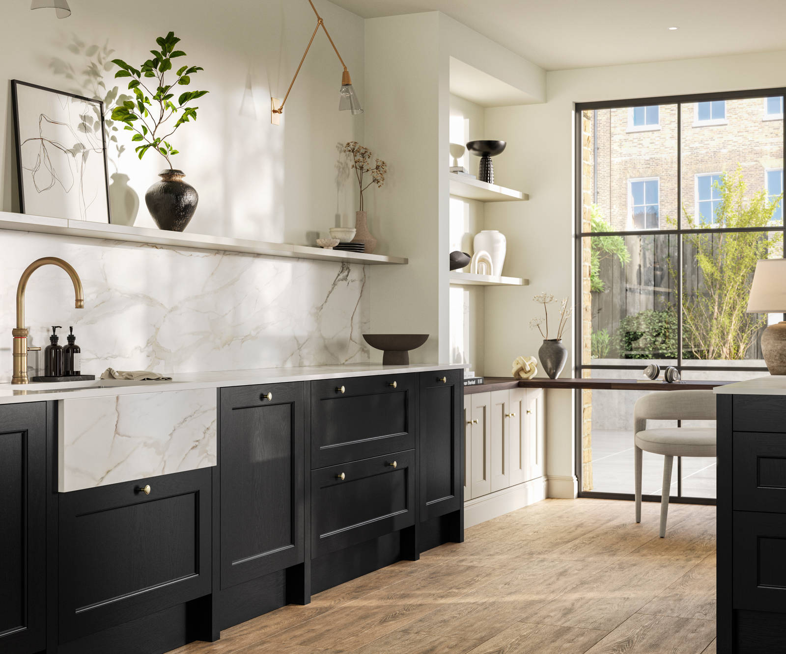 Traditional Shaker-style tactile woodgrain Ludlow Sumi Black kitchen with kitchen island, light and airy with brass accessories, marbled white and grey worktop, home office area by full height windows and Amtico oak stripwood vinyl flooring.
