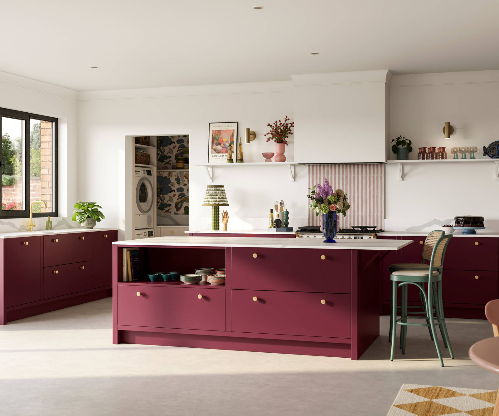 Modern slab front Soho Morello kitchen, kitchen island with rattan bar stools at breakfast bar, Bianco calacatta worktop and upstand, brass knobs and open shelf in kitchen island holding eclectic eramics, utility room with matching Soho cabinetry in the shade  Shell.