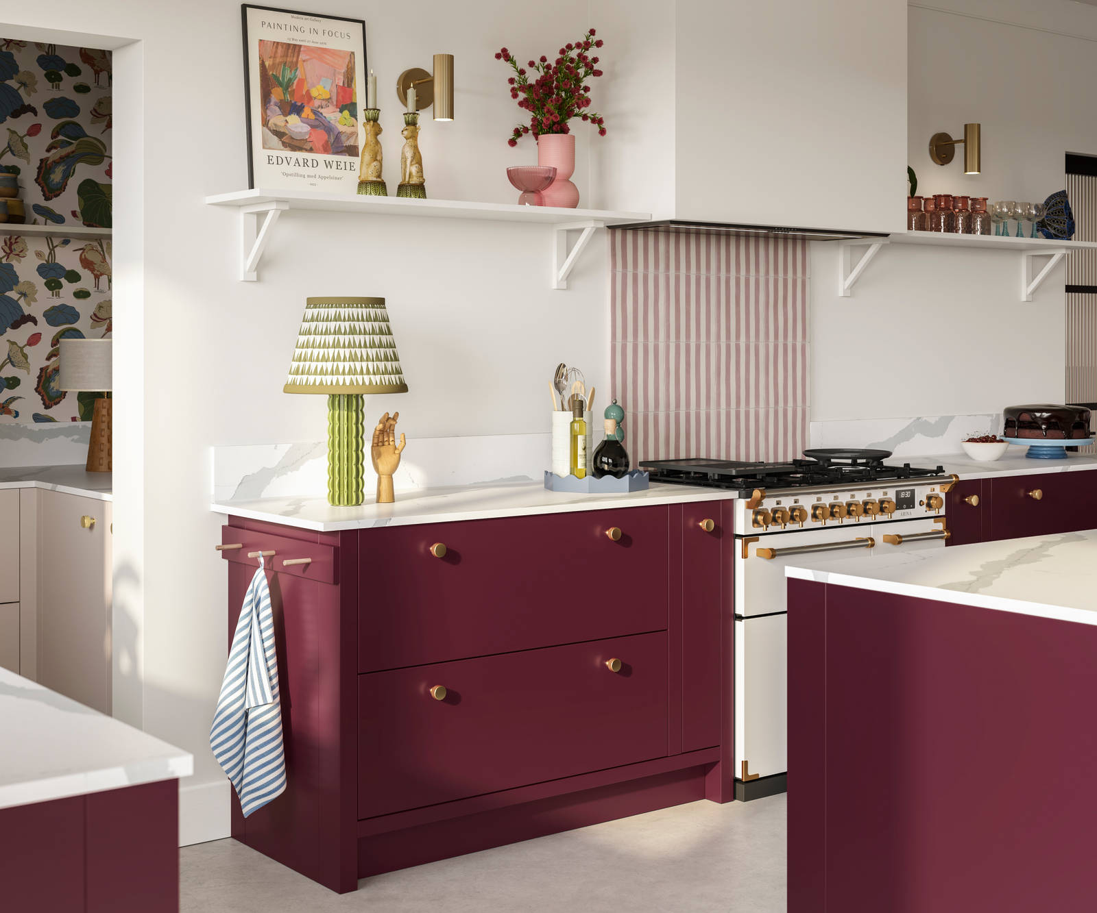 Modern slab front Soho Morello and Shell kitchen with kitchen island, Bianco calacatta worktop and upstand, brass knobs and open wall shelves holding eclectic decorations and glasses.