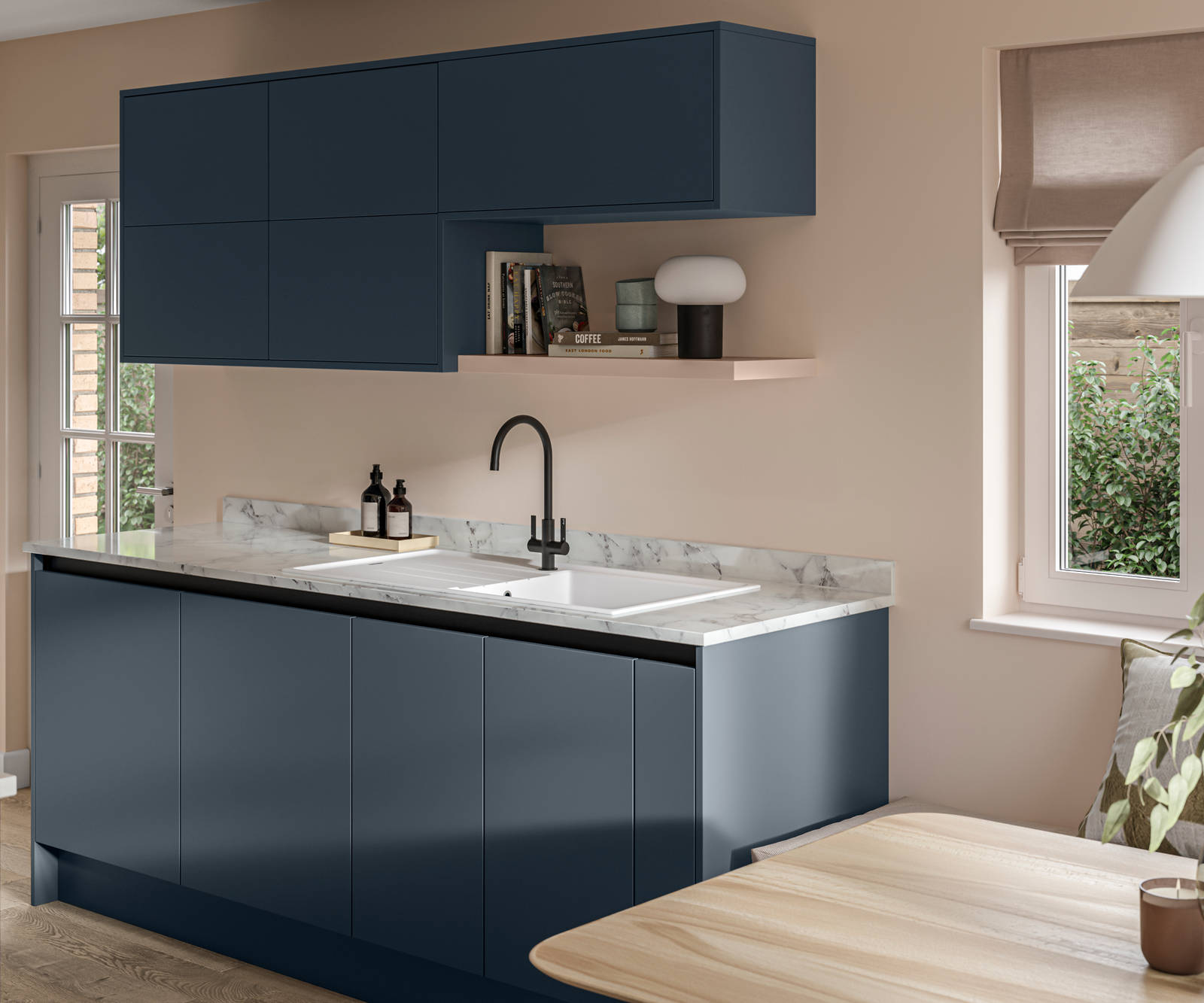 Handleless Integra Ascoli Mineral Blue, a dark blue kitchen with a wood wall shelf, rounded matt black tap with white sink, a white and grey marbled worktop with matching upstand.