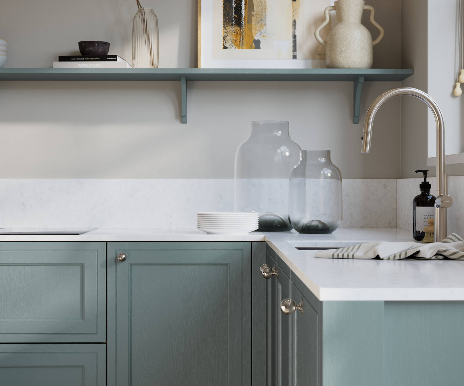 Bewdley Duck Egg painted wood grain Shaker kitchen cabinetry with steel knobs, steel tap, white marbled worktop and matching backsplash, an open shelf on the wall above cabinets with ceramics and a vase of flowers.