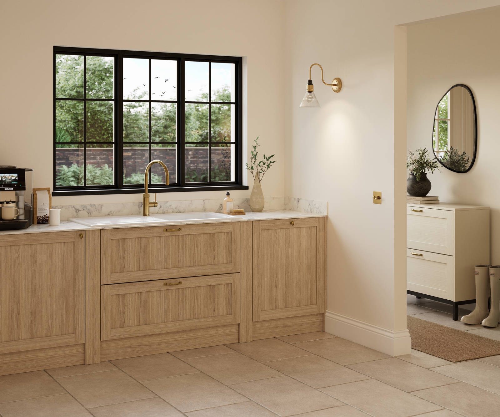 Traditional premium contemporary Shaker kitchen Ambleside in oak with brass knobs and handles, marbled worktop and upstand, brass tap and white ceramic sink.