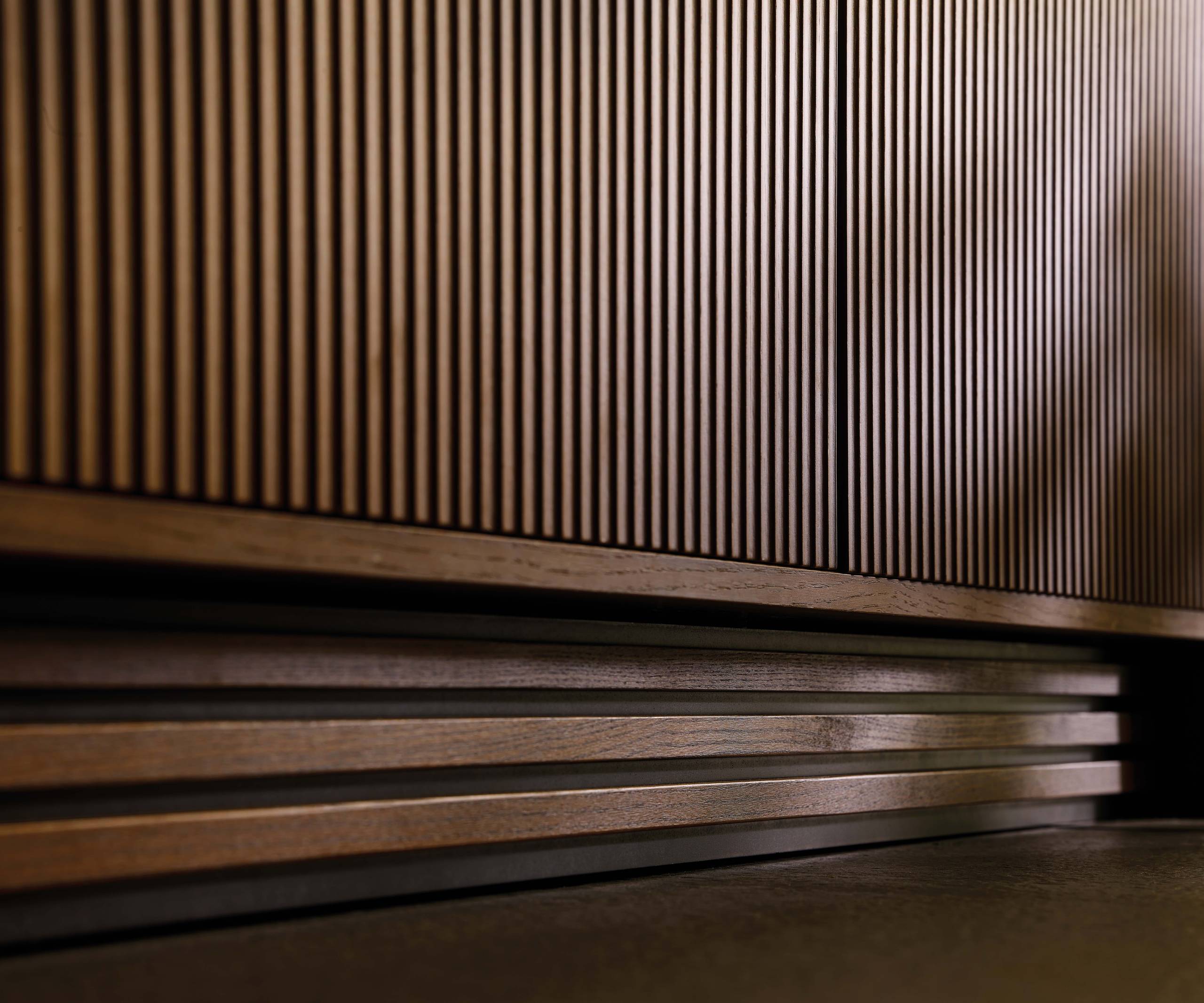 Close-up of plinths in oak under Fluted wood cabinetry in Magnet's kitchen Nordic Nature.