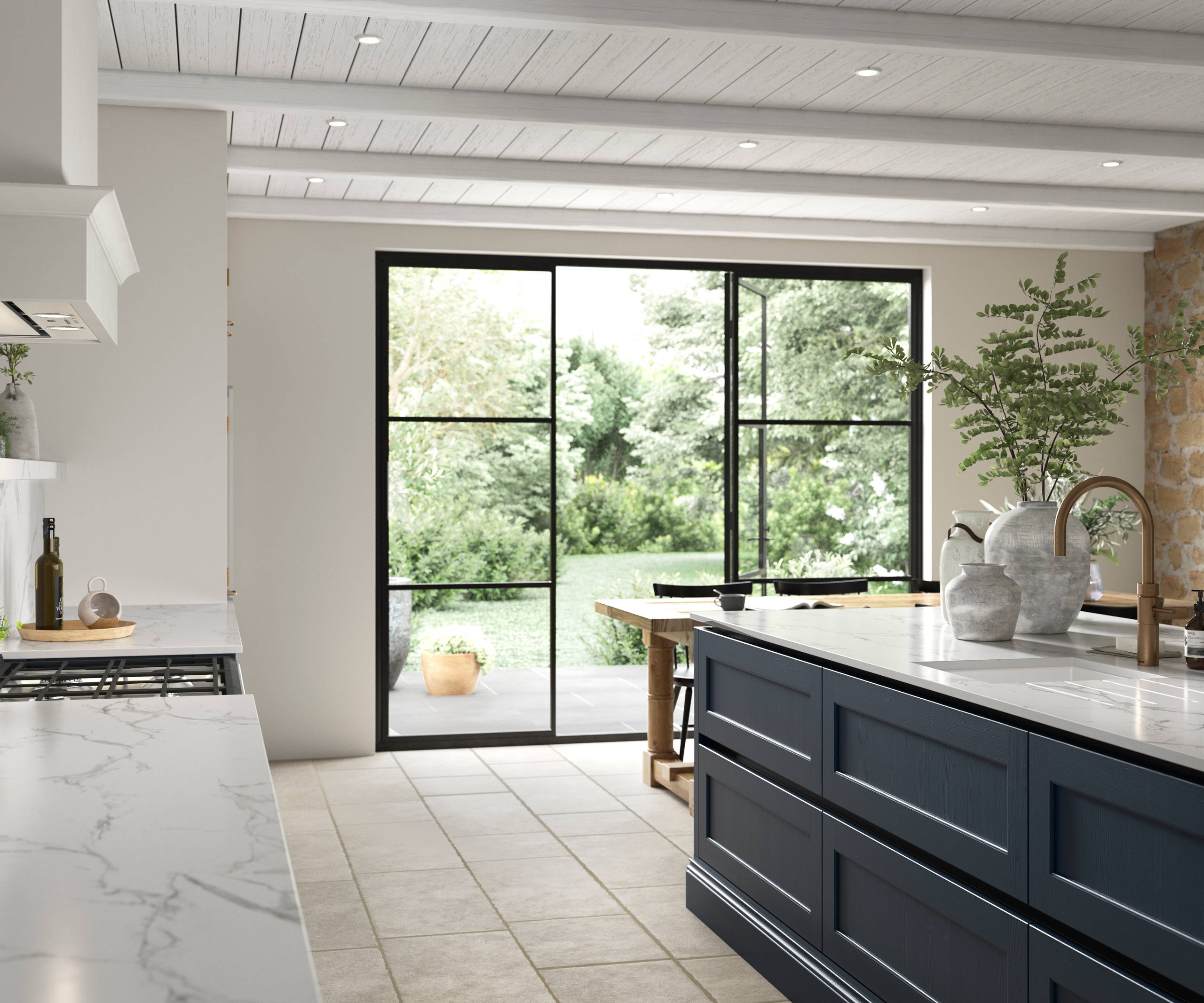 View of Integra Ludlow kitchen island in shade Midnight, with opened glass doors to a garden in the background.