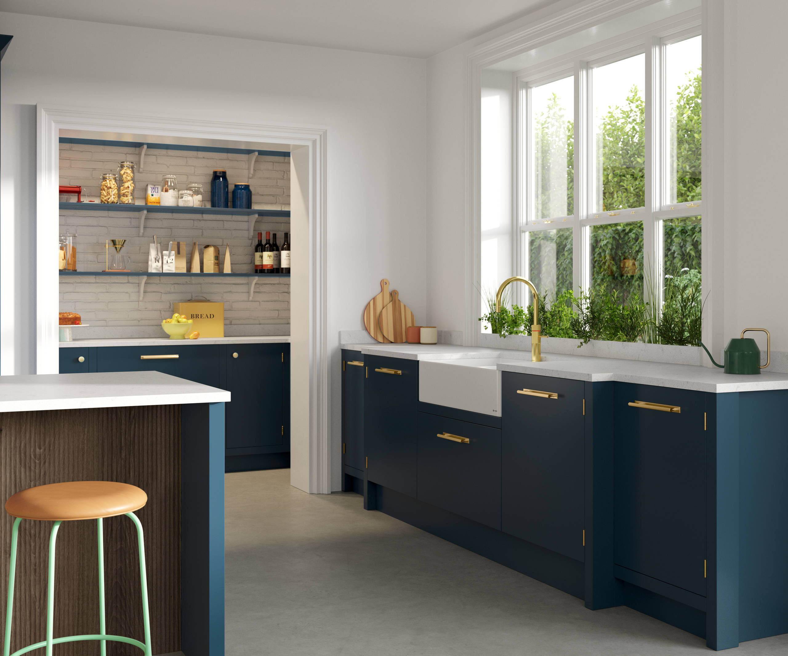 Corner view of Soho Voyage Blue kitchen white porcelain wink, brass tap and matching brass handles.