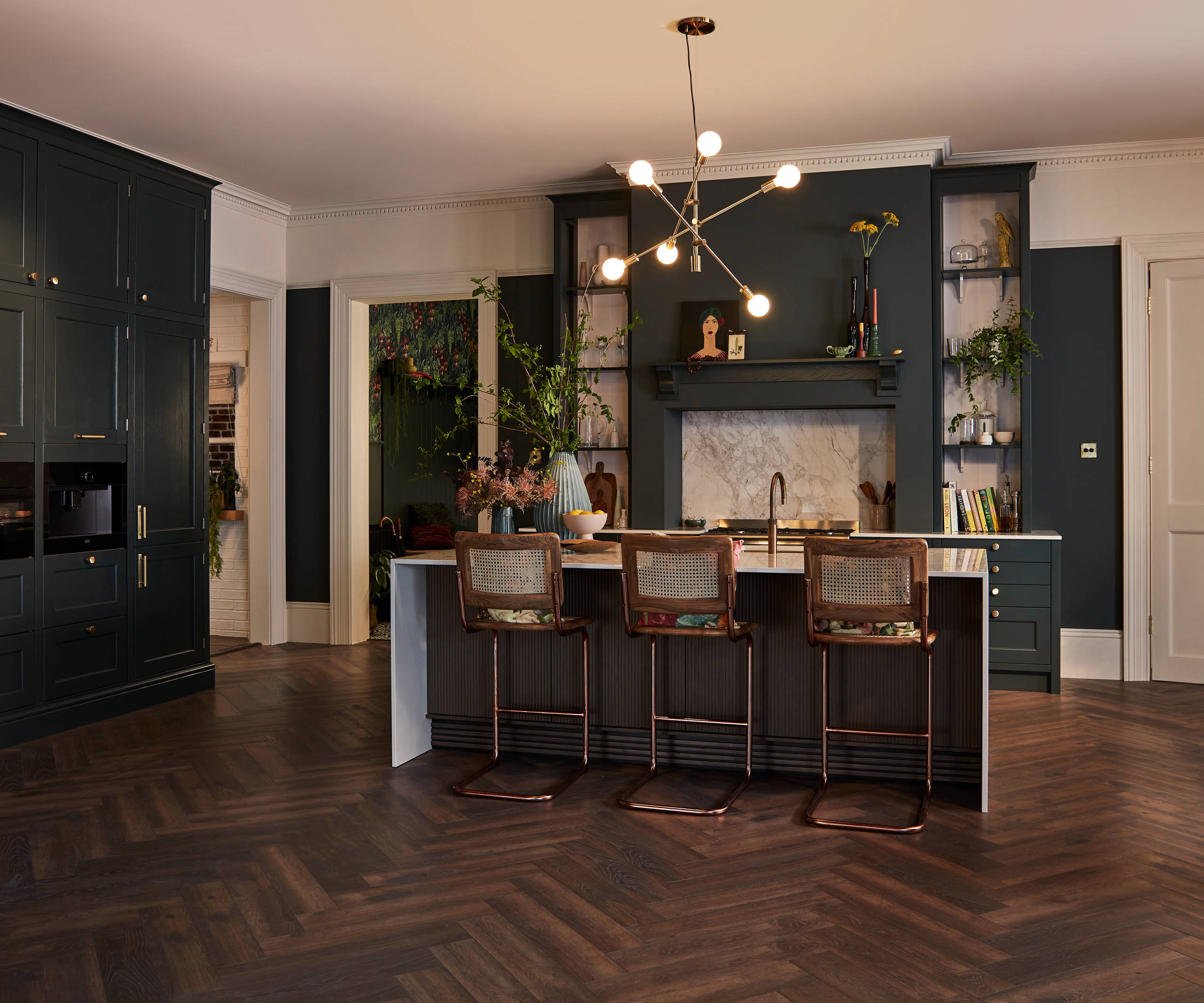 Traditional Shaker-style kitchen range featuring panelled doors with visible woodgrain and beading detail
