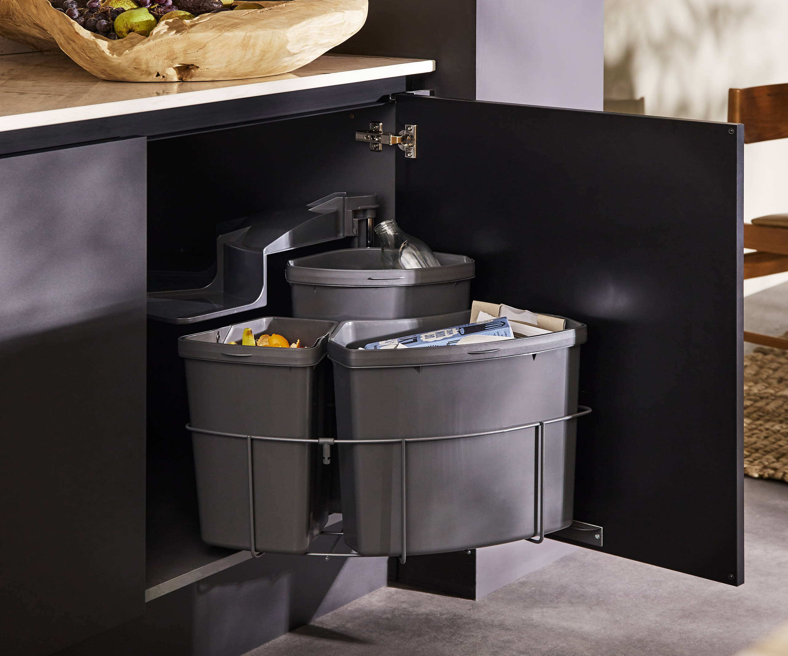 Interior of Hoxton Sumi Black cabinetrywith waste sorting bins.