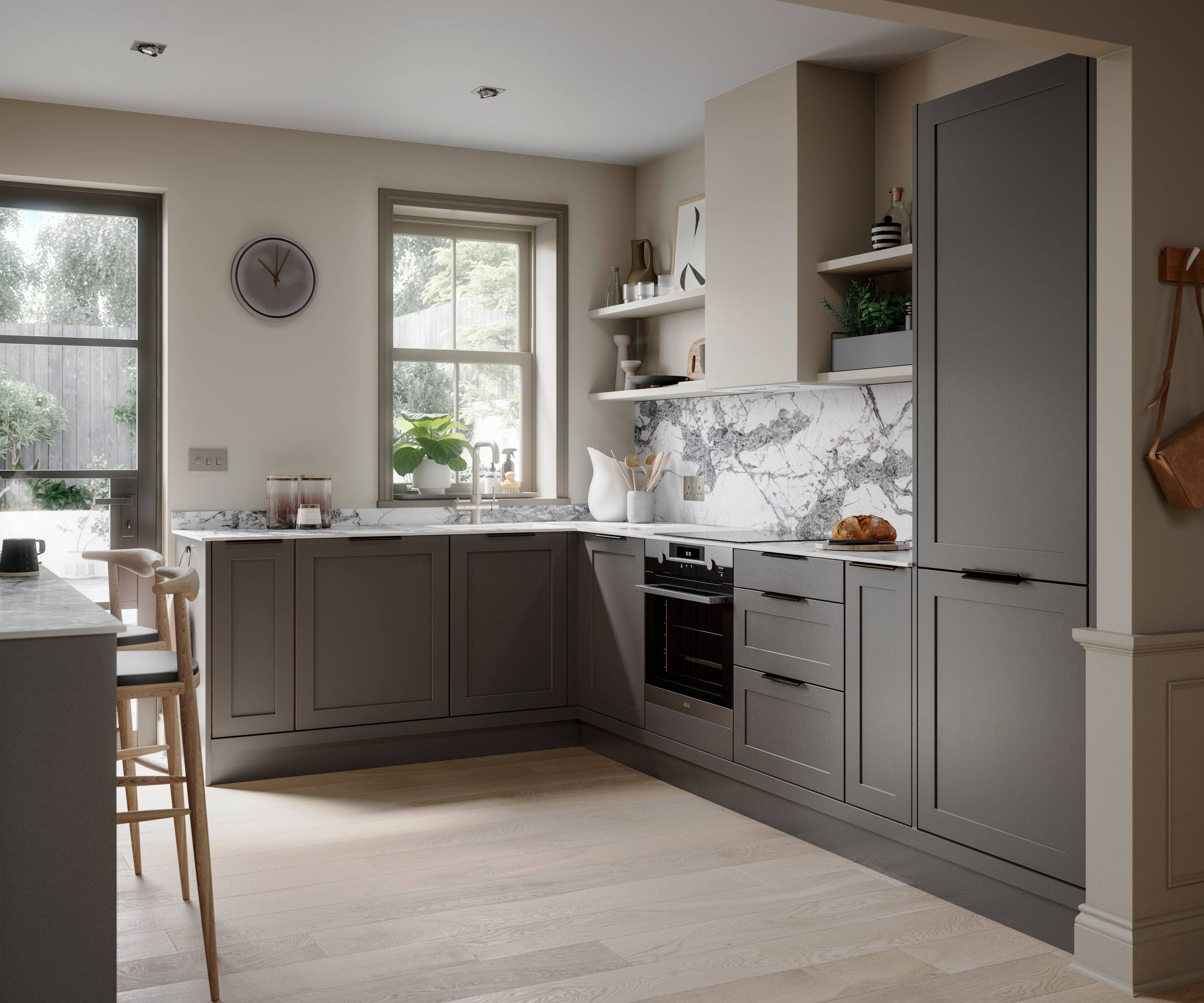Shaker kitchen in dark grey shade Charcoals, matched with a marble worktop and backsplash.