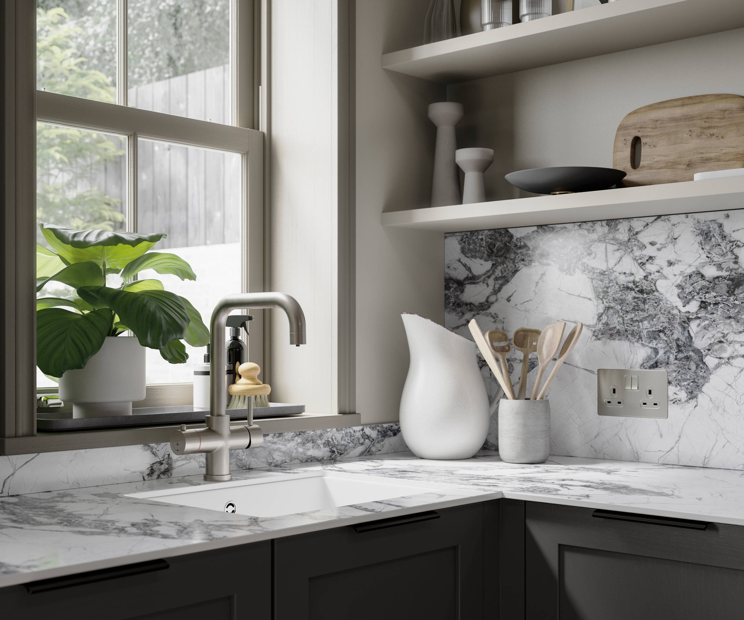 Close-up of marble worktop and backsplash in dark grey shaker kitchen.