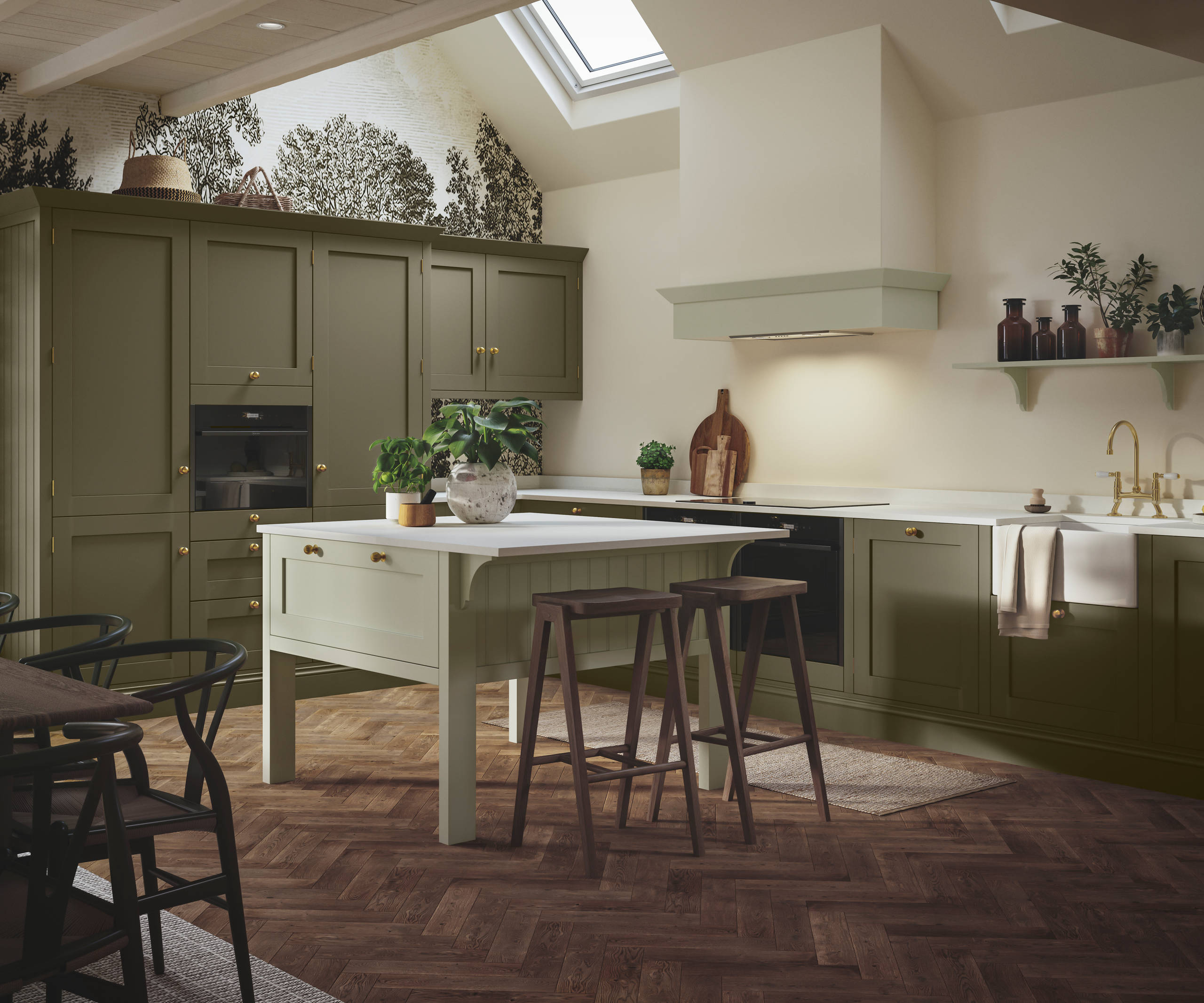Wardley Arboretum cabinets paired with brass handles and kitchen tap makes an an elegant, contemporary Shaker kitchen, with a lighter shade kitchen island.