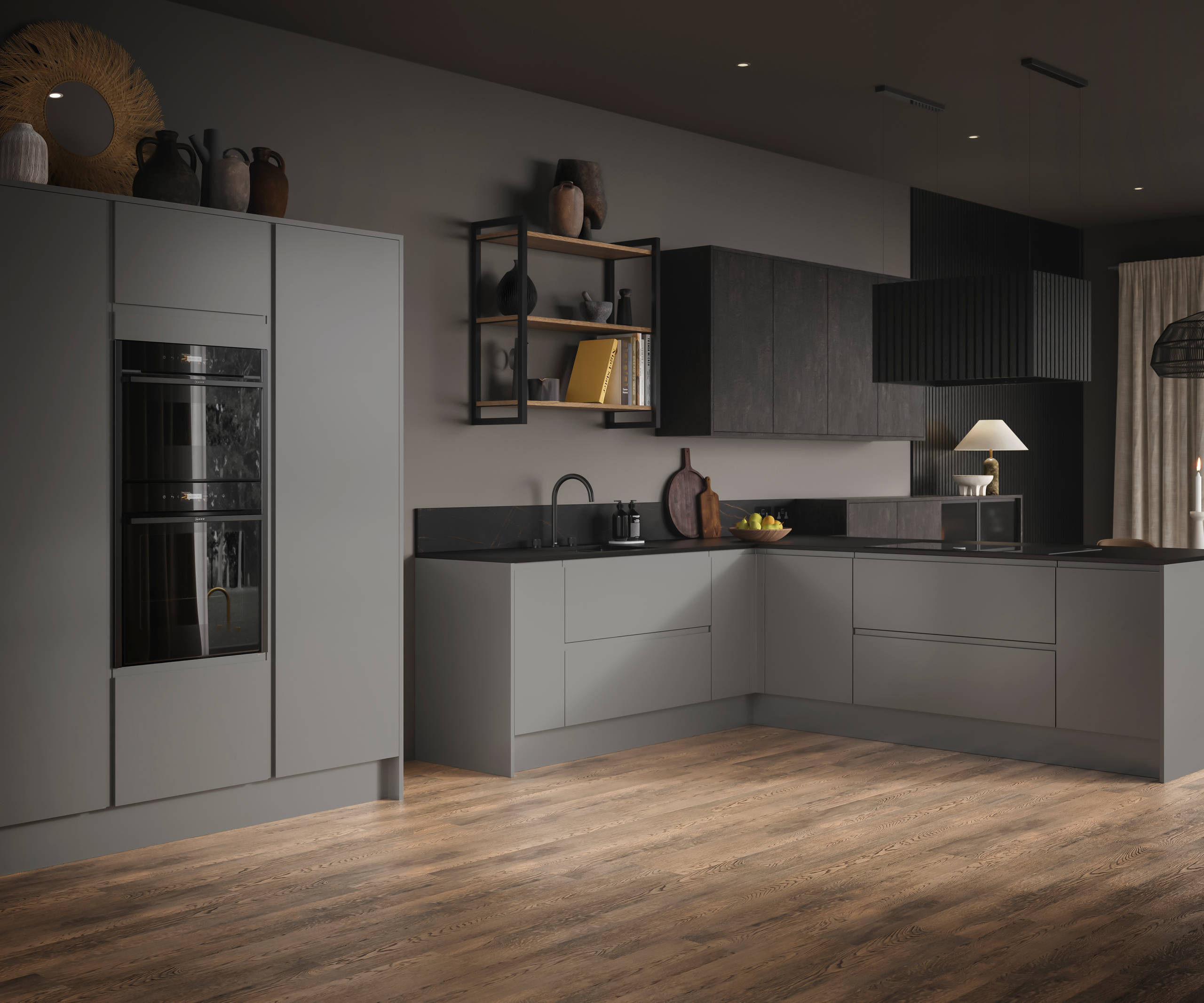 A wide-angle view of an open plan Duxbury kitchen with black appliances, dark worktops and open shelving with earthy accents.