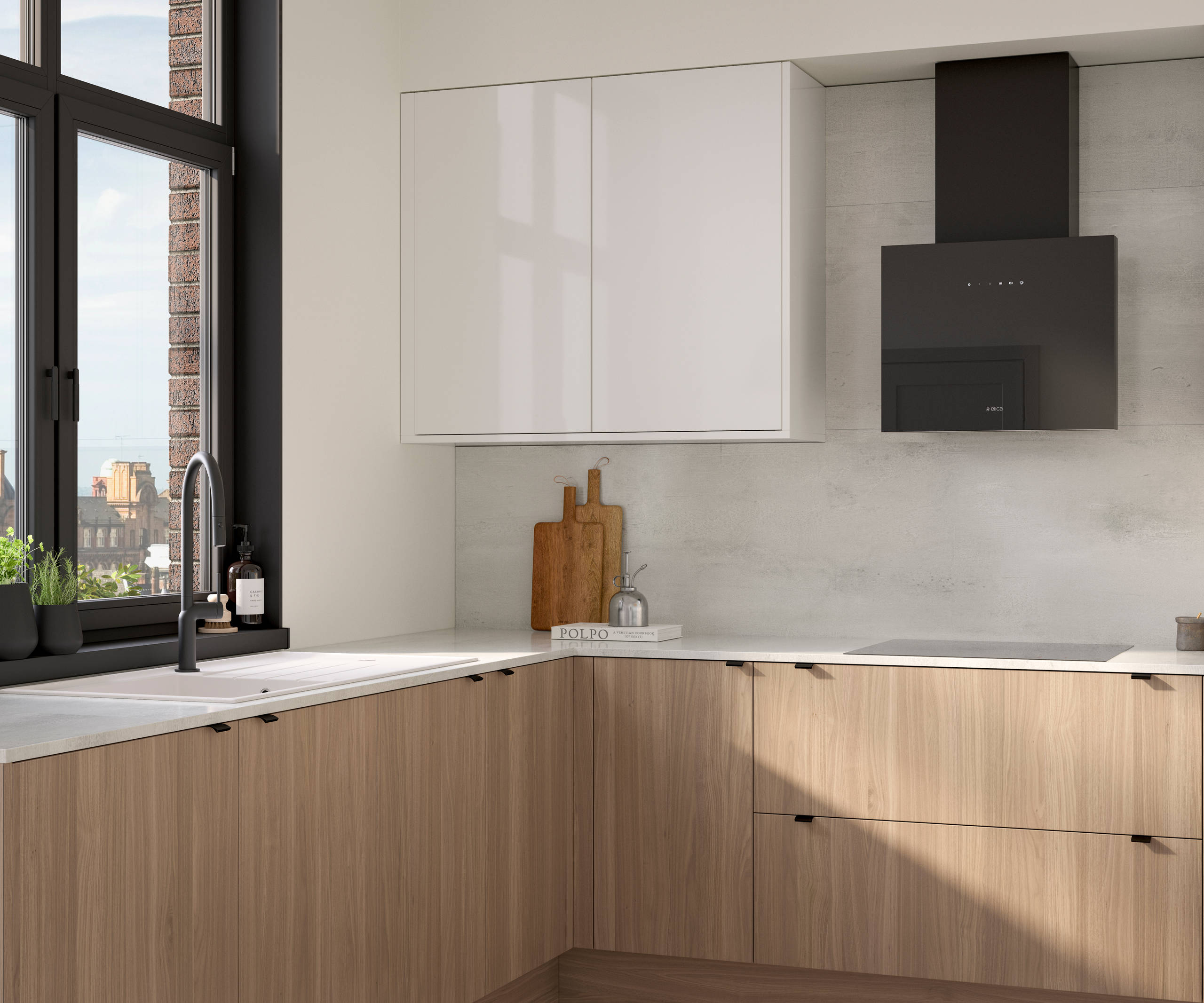 Ascoli kitchen from Magnet with Natural Oak cabinetry, a white worktop, Ascoli Gloss white wall cabinets over countertop paired with matching black handles, tap, hood and window frame over white sink.