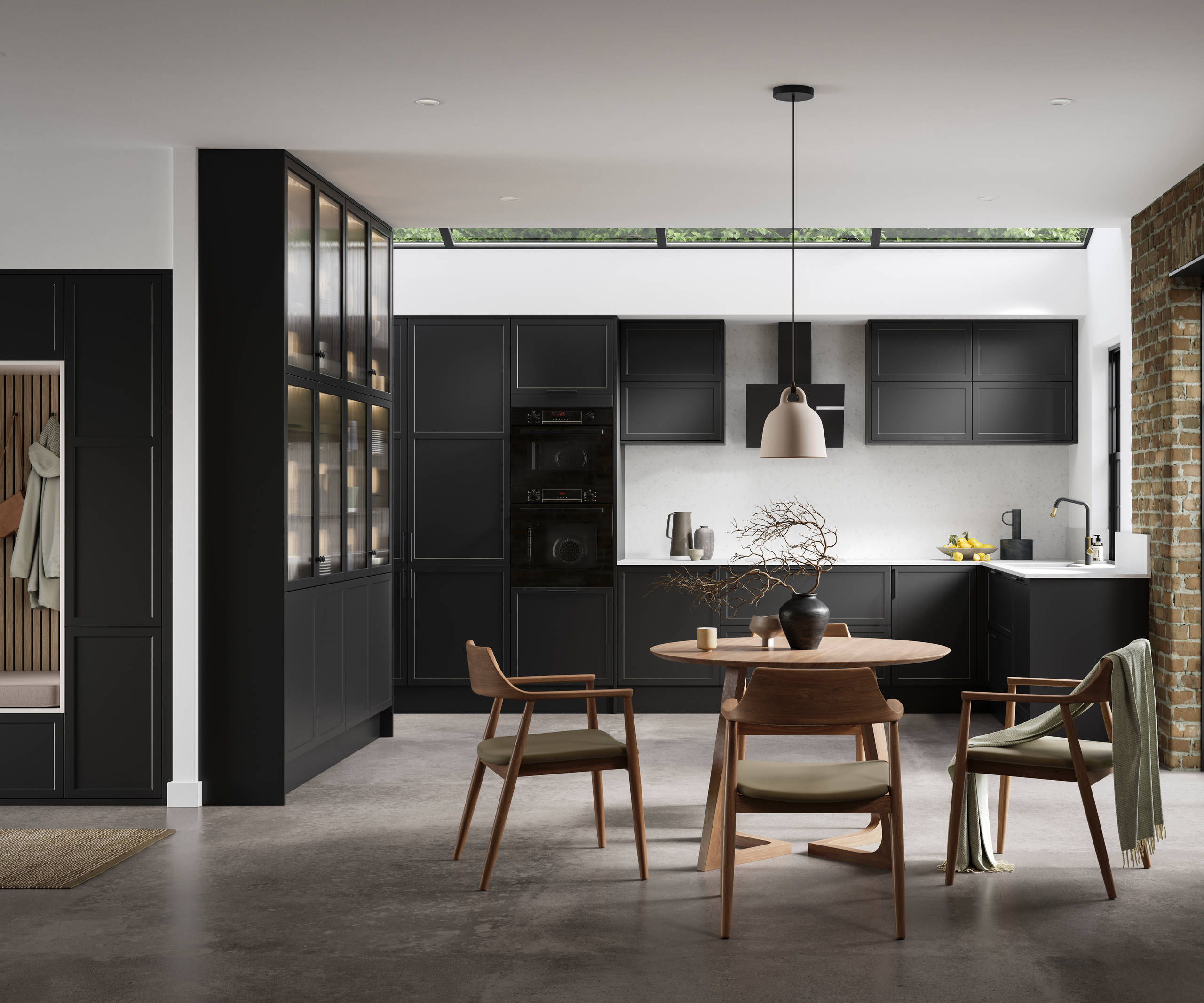 Modern Shaker kitchen Brunswick Sumi Black handleless with integrated ovens in tall cabinetry, open layout living room with wood dining table, hallway cabinetry with coat hangers and akupanel.