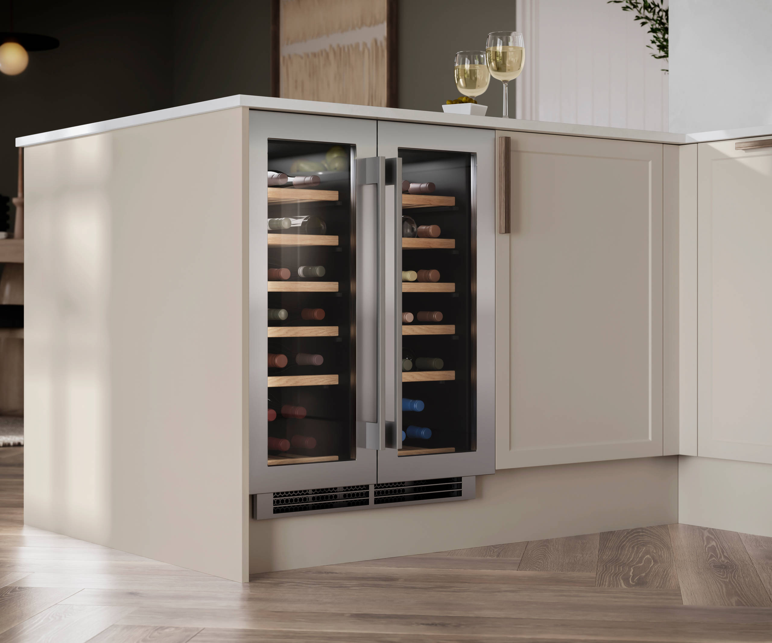 Integrated Wine cooler Caple in Modern Shaker Brunswick Limestone kitchen with oak handles and light wood herringbone flooring.