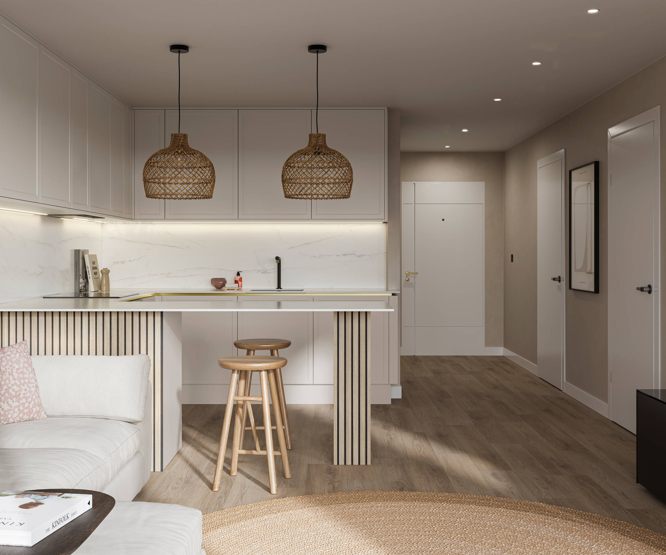 View from living room of handleless Wabi sabi inspired Integra Brunswick Limestone kitchen combined with living area, wood barstools for breakfast bar, natural materials, Euros oak flooring.