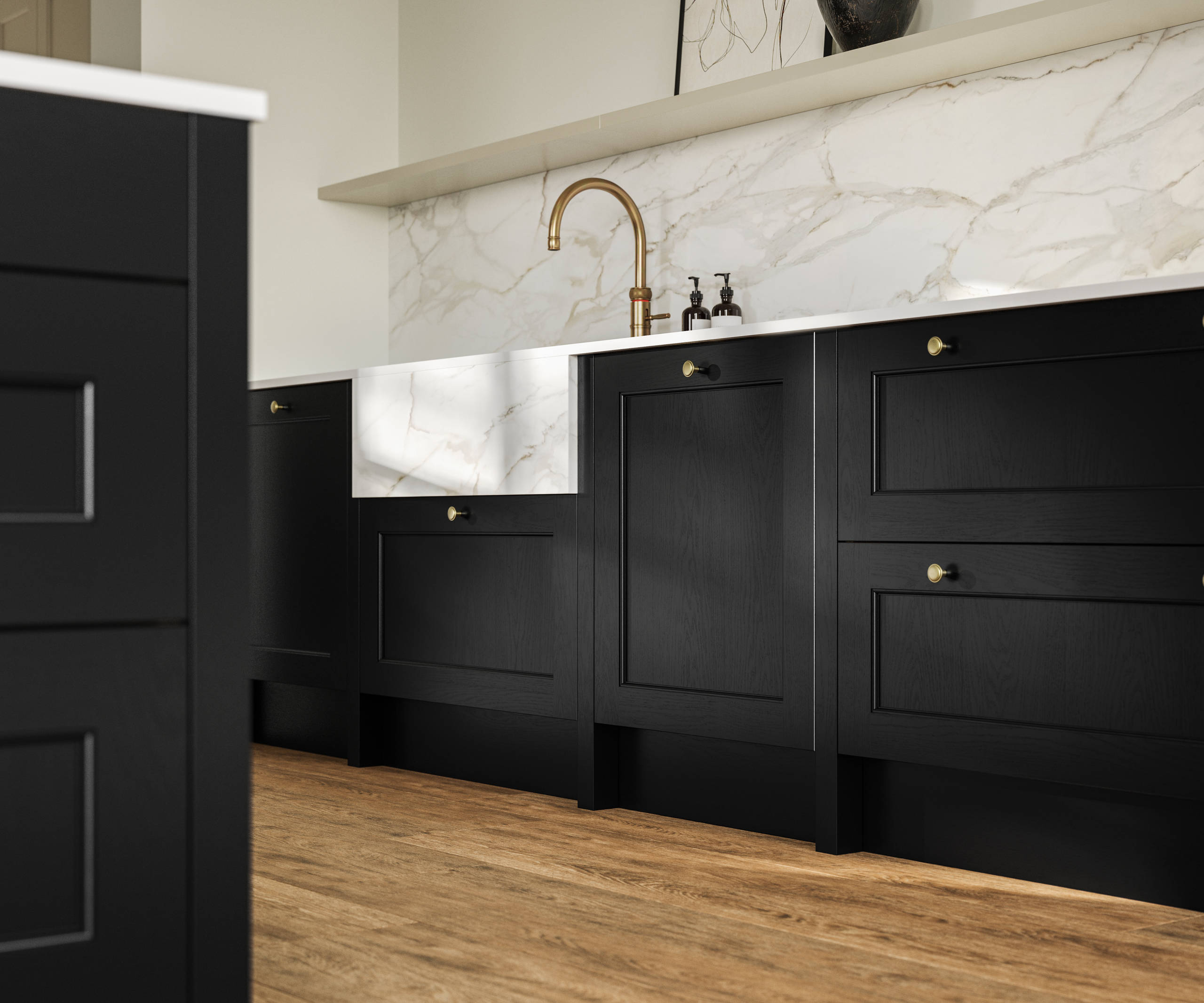 Traditional Shaker-style tactile woodgrain Ludlow Sumi Black kitchen with brass knobs, brass tap and white ceramic sink, white and grey marbled splashback and Amtico oak stripwood vinyl flooring.