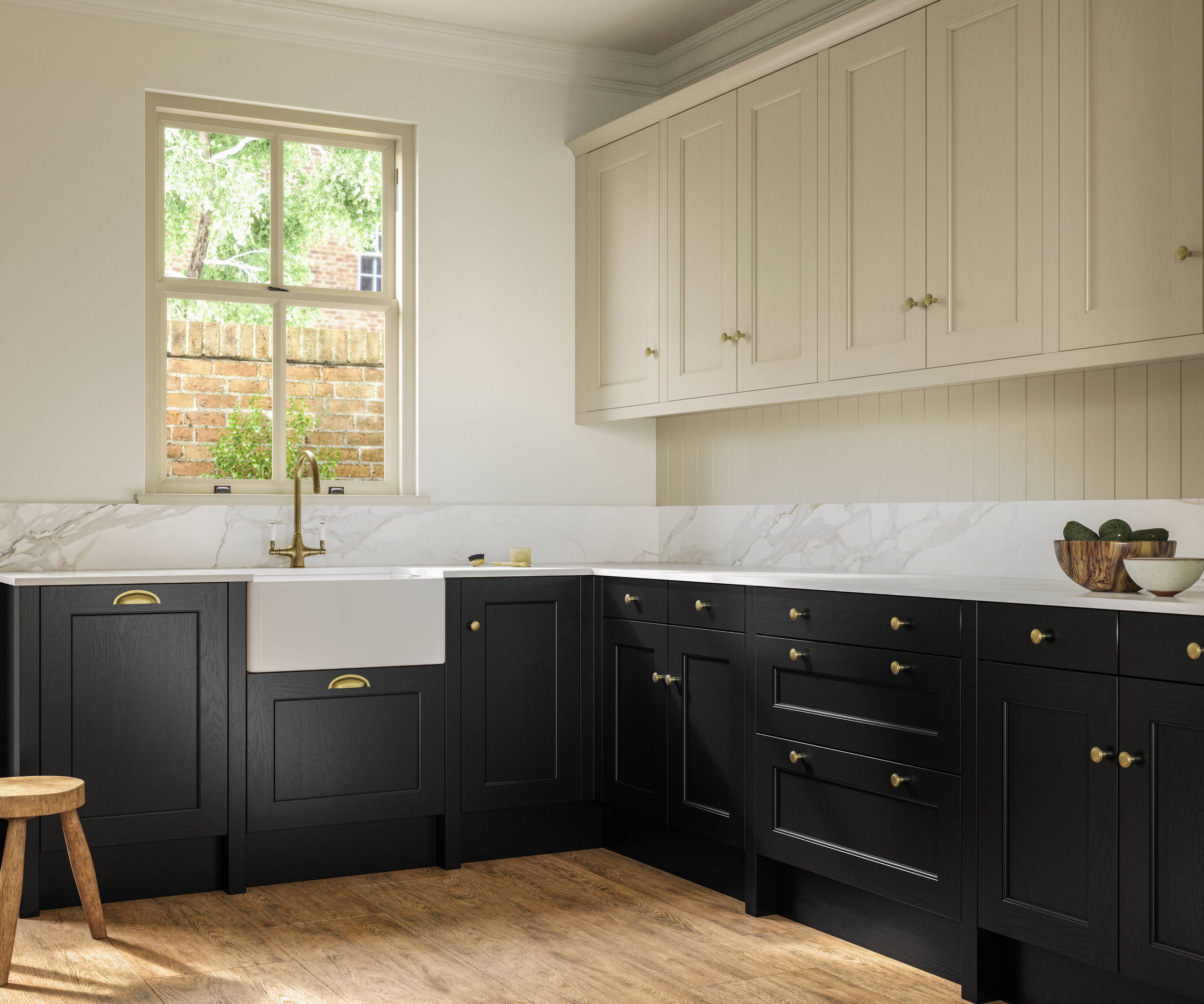 Traditional Shaker-style tactile woodgrain Ludlow Sumi Black kitchen with Ludlow French Clay wall cabinets with matching wall panel, brass knobs and brass tap, white ceramic sink, white and grey marbled worktop and splashback, oak stripwood vinyl flooring.