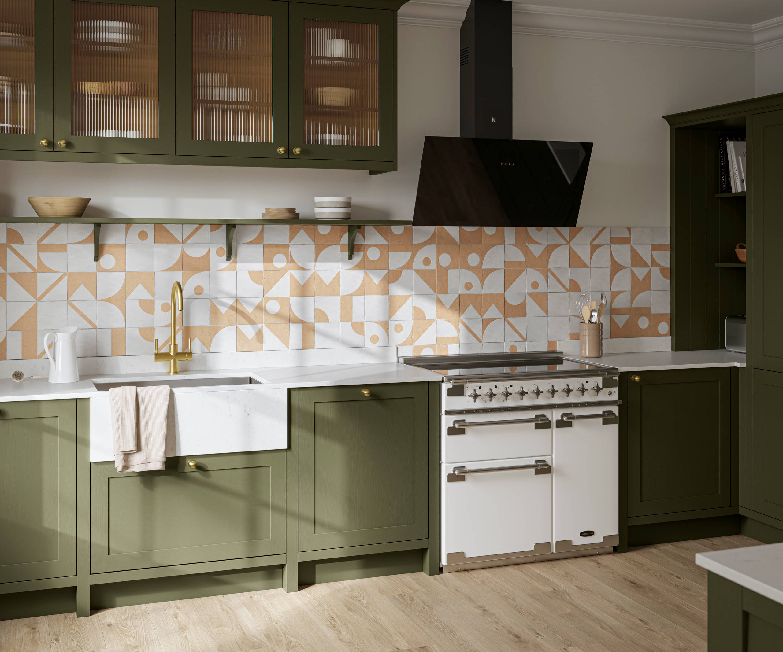 Premium Shaker kitchen Wardley Tailored green with traditional detailing, brass accessories, Elise range oven, screen extractor, white worktop and Classic Flint Grey oiled oak engineered wood flooring.