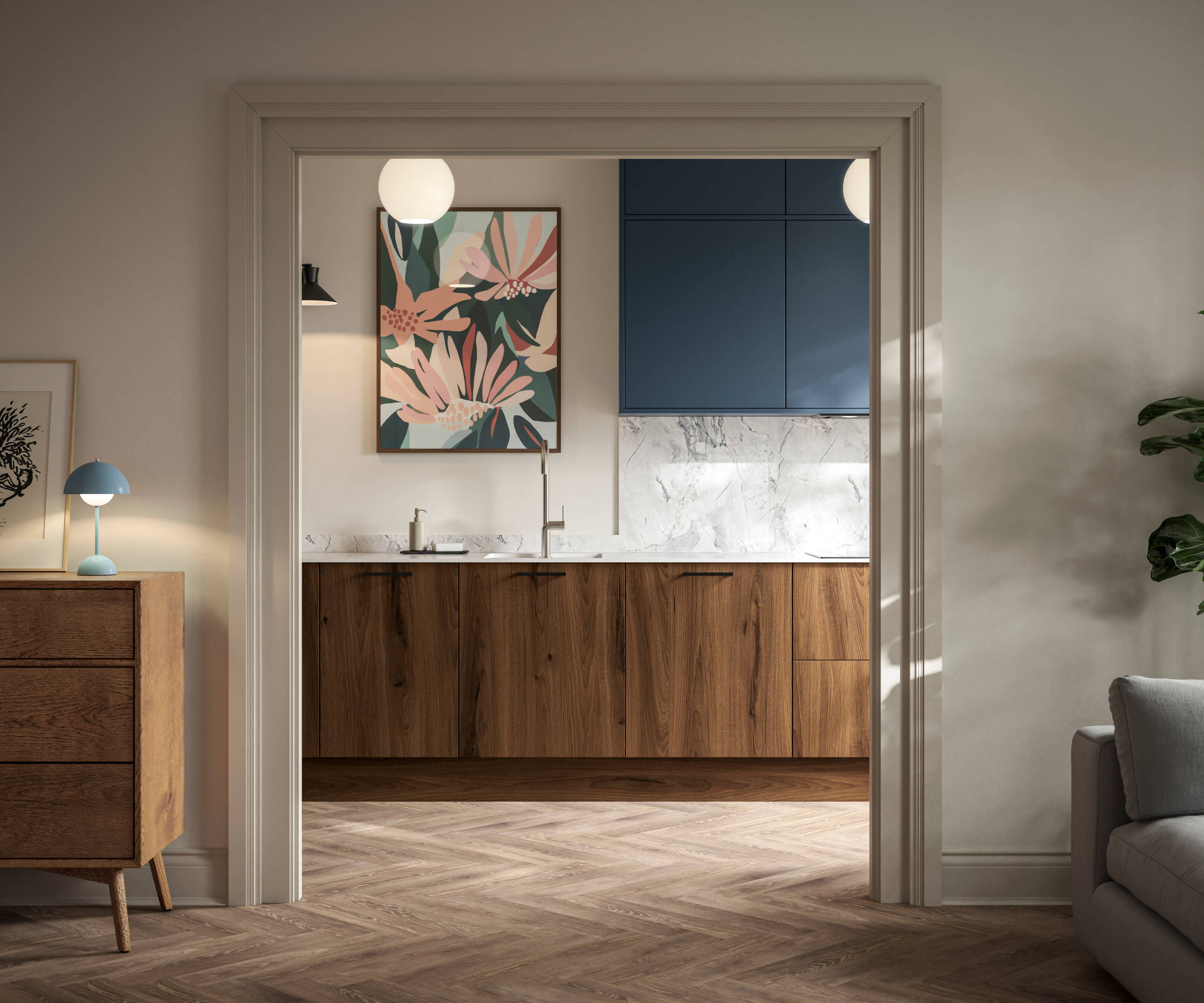 View from living room of Portobello Umbra kitchen cabinets with white compact laminate worktop and splashback, Ascoli Mineral Blue wall cabinets and amtico smouldered oak herringbone flooring.