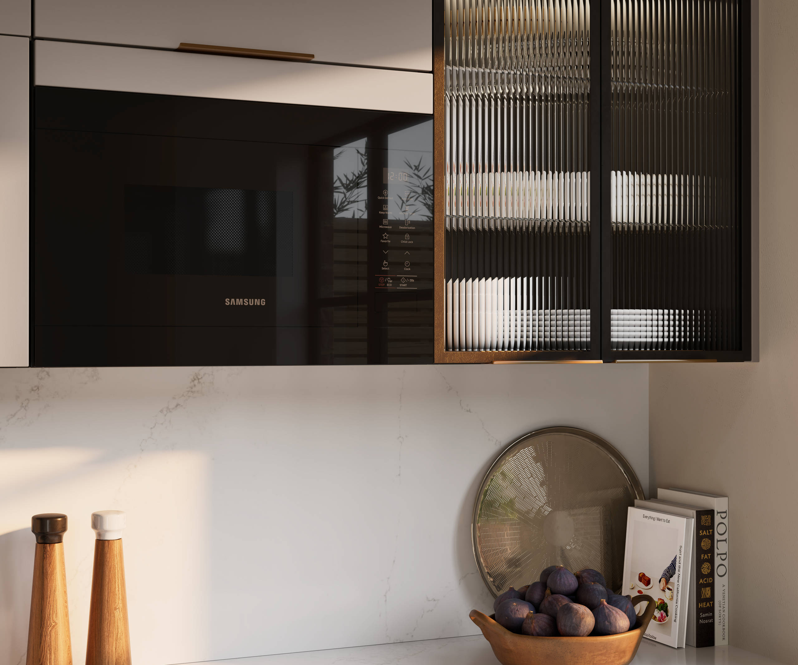 Close-up view of fluted glass vitrine in modern slab front Soho Cornish Clay kitchen from Magnet in Pantone’s colour of the year ‘Mocha Mousse’ with bronze trim handles, handles, silestone quartz worktop and matching backsplash.