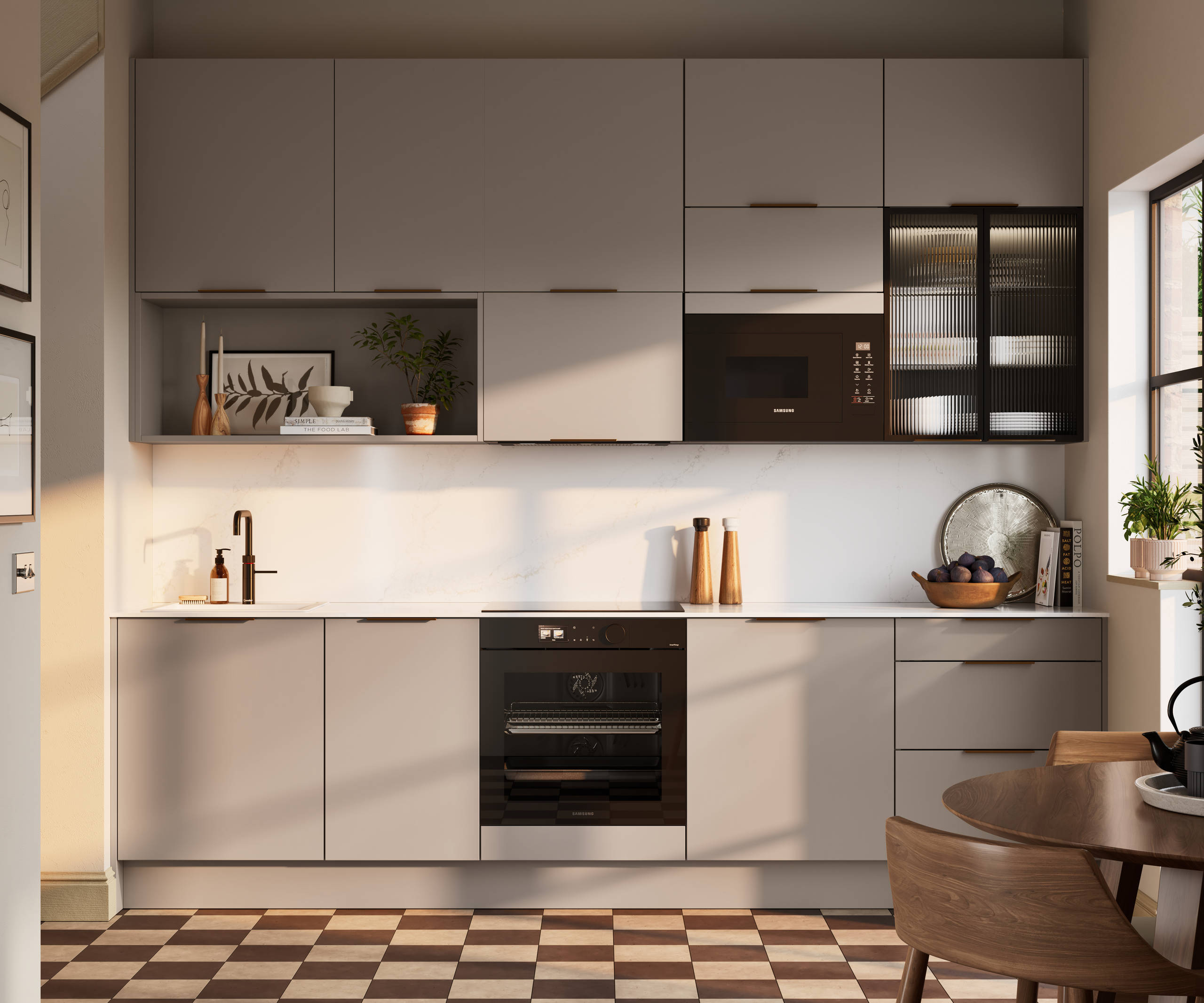 Modern slab front Soho Cornish Clay kitchen from Magnet in Pantone’s colour of the year ‘Mocha Mousse’ with bronze trim handles, handles, silestone quartz worktop and matching backsplash, checkered flooring.