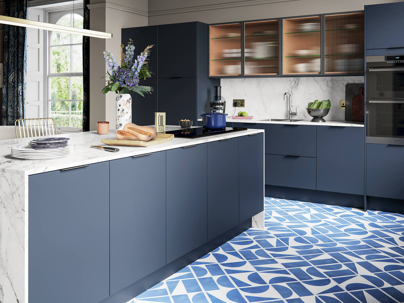 Hoxton kitchen. Smooth slab doors in a painted effect finish. Minimalist styling with your choice of handles and three colours.