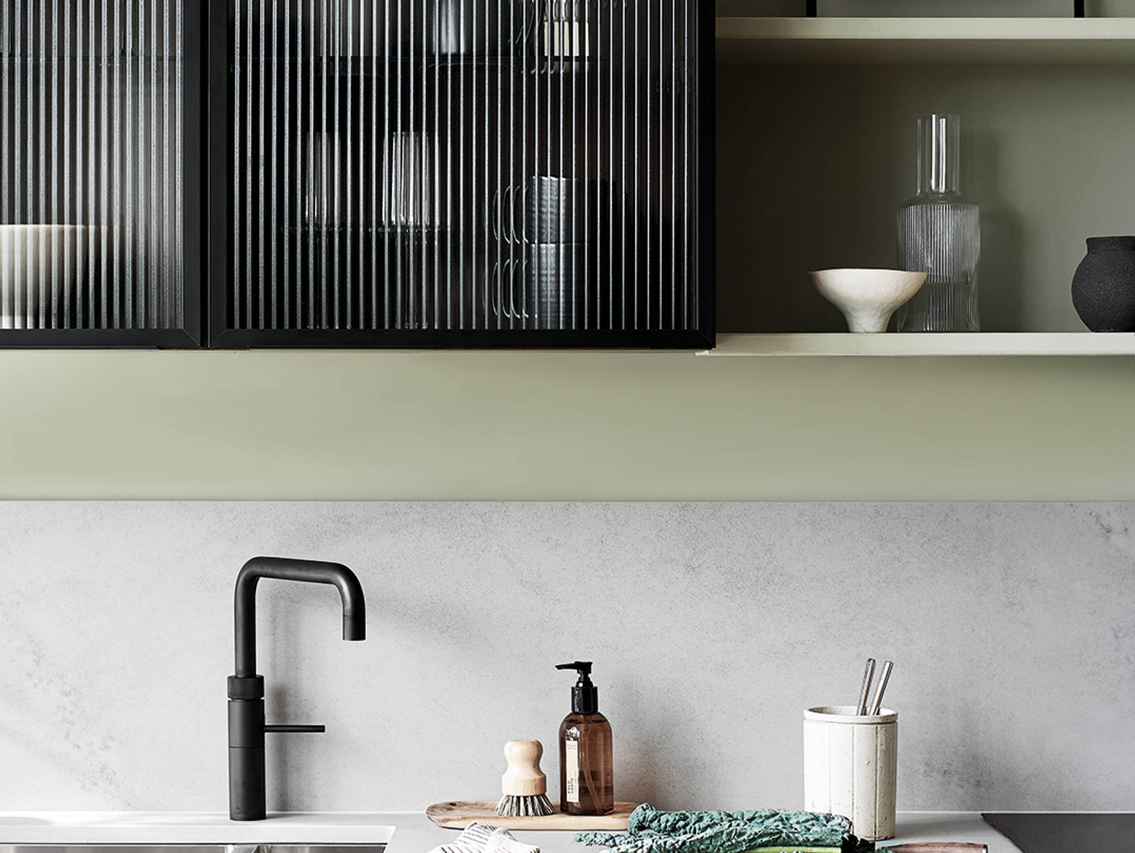 Nordic Nature. Modern wooden kitchen design with a Nordic influence. Featured floating worktops, a ribbed plinth and rounded end panels.