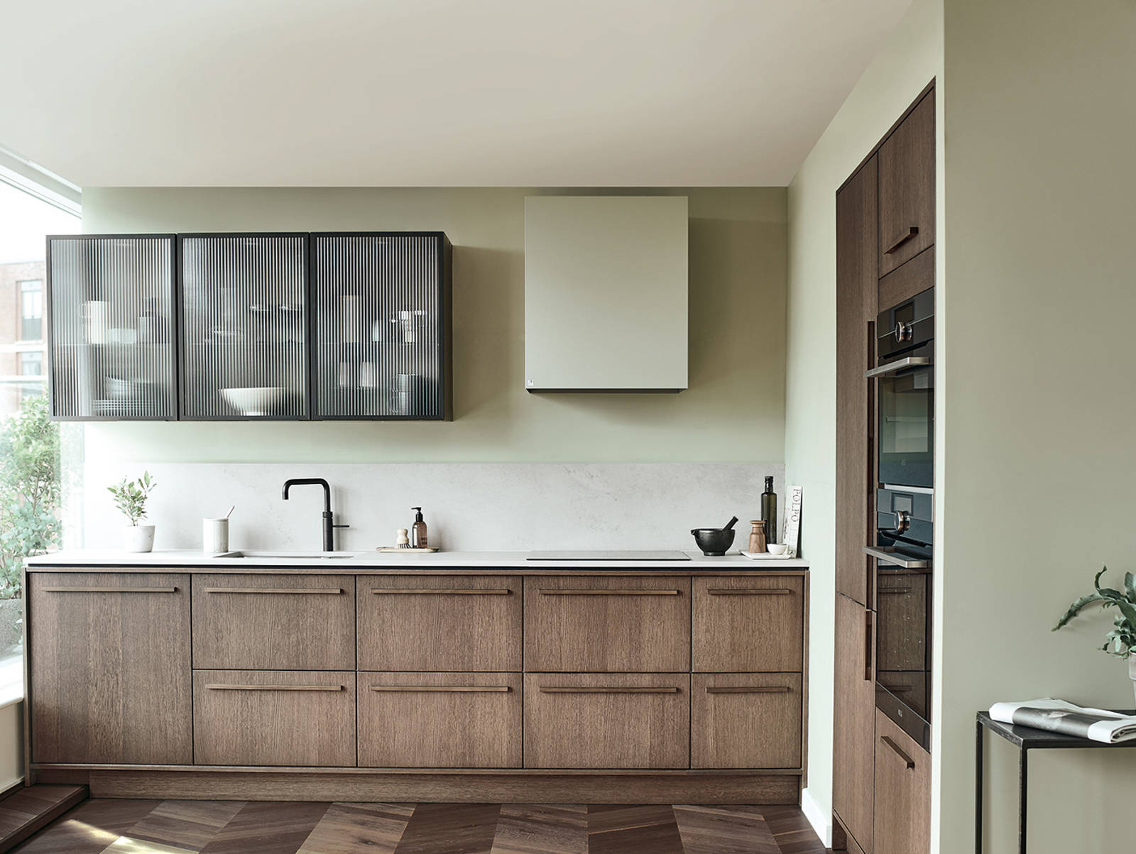 Nordic Nature. Modern wooden kitchen design with a Nordic influence. Featured floating worktops, a ribbed plinth and rounded end panels