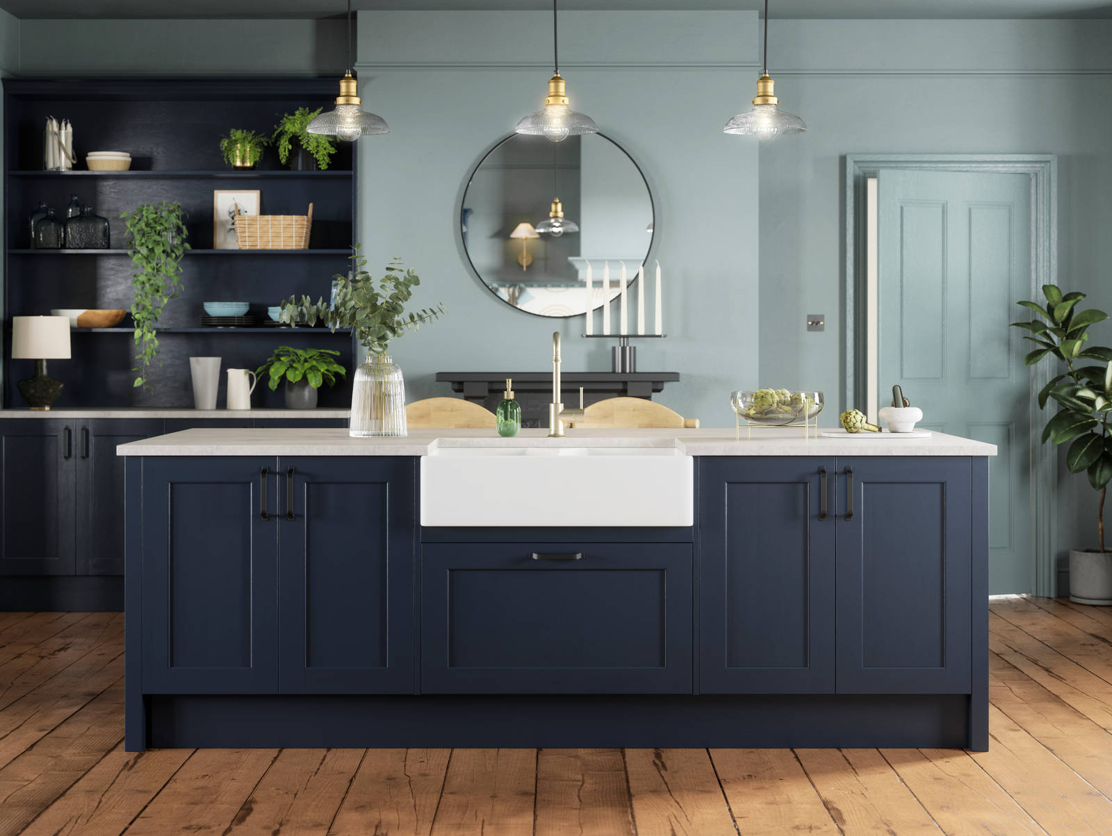 Modern country-style kitchen island with Shaker door Ludlow in dark blue shade Midnight, a porcelain sink, marbled worktop, brass tap and open shelves in matching blue.