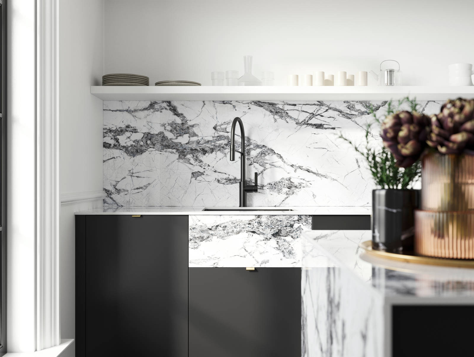 Minimal maximalism with Magnet's Hoxton kitchen in Sumi Black, combined with fake belfast sink using with white marbled worktop and splashbacks.