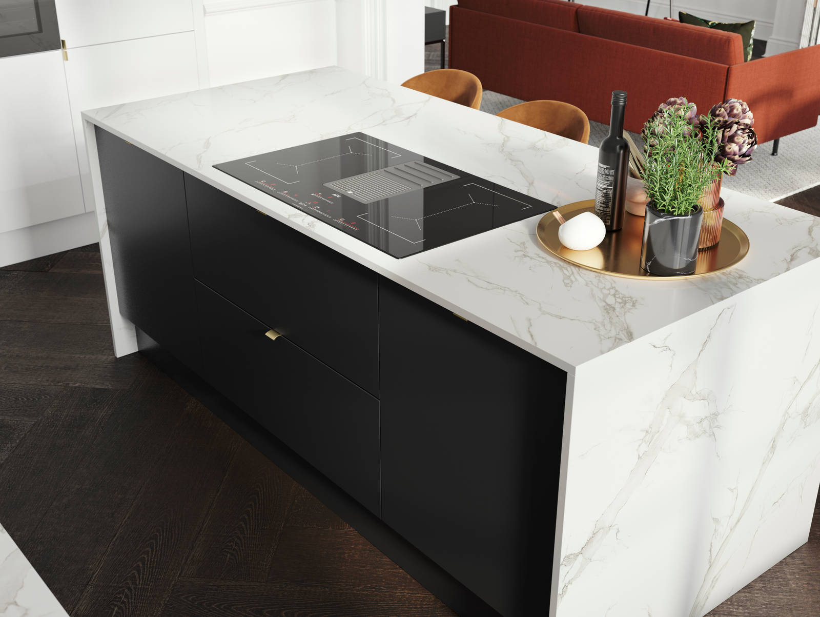 Overhead view of kitchen island, covered with marbled decor side in Magnet's minimal maximalism Hoxton kitchen in Sumi Black.