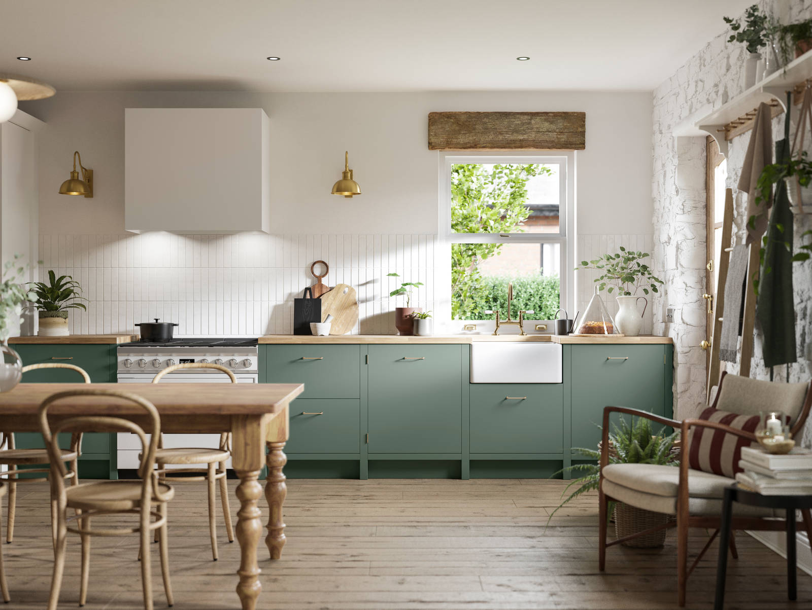 Soho Eucalyptus green open plan kitchen in contemporary cottage with a light wood dining table.