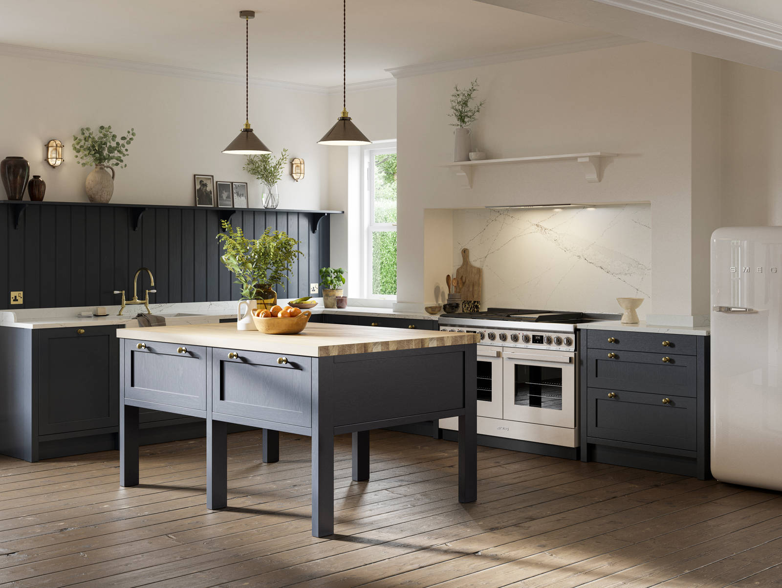 Open floorplan shaker kitchen in the dark blue shade Midnight, paired with a kitchen island and white Smeg fridge.