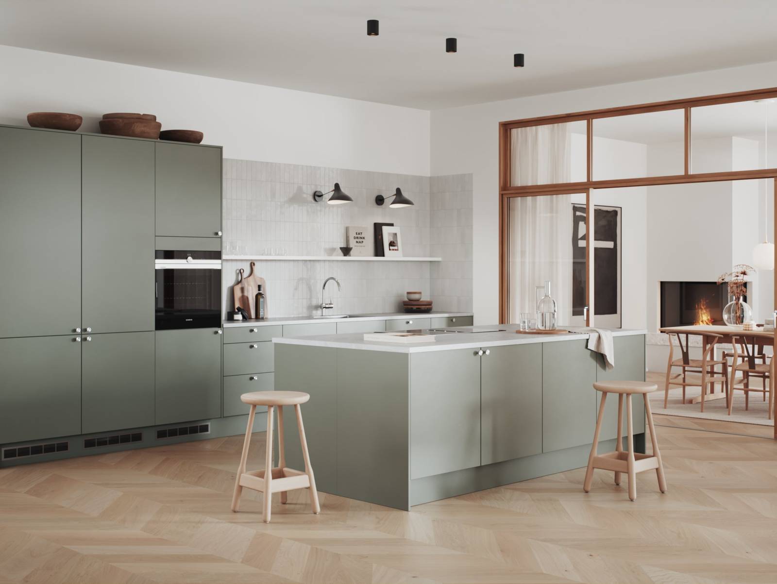 Hyperkäytännöllinen vihreä keittiö, jossa on helposti puhdistettavat etupinnat maalattua tavallista MDF-levyä.